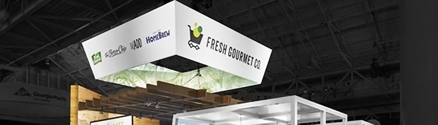 Get Your Exhibit Noticed with Overhead Structures and Hanging Signs