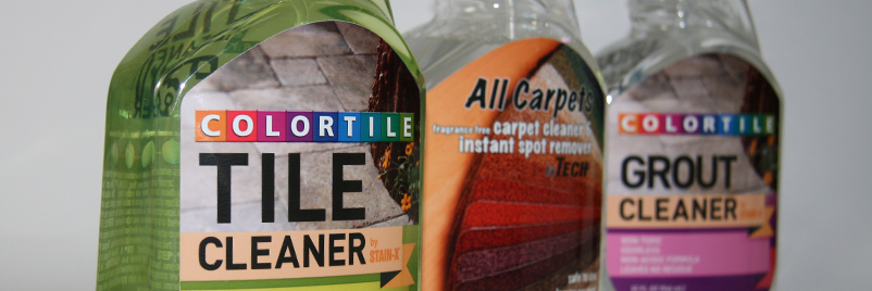 Three cleaning product bottles labeled ColorTile Tile Cleaner, All Carpets Carpet Cleaner, and ColorTile Grout Cleaner.