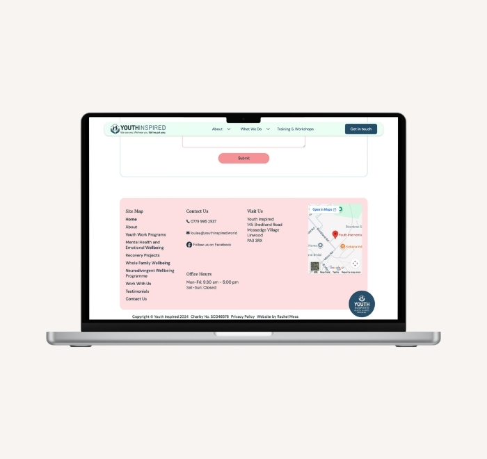 Laptop showing a pale pink footer, with complete site map, and the location of the Youth Inspired base