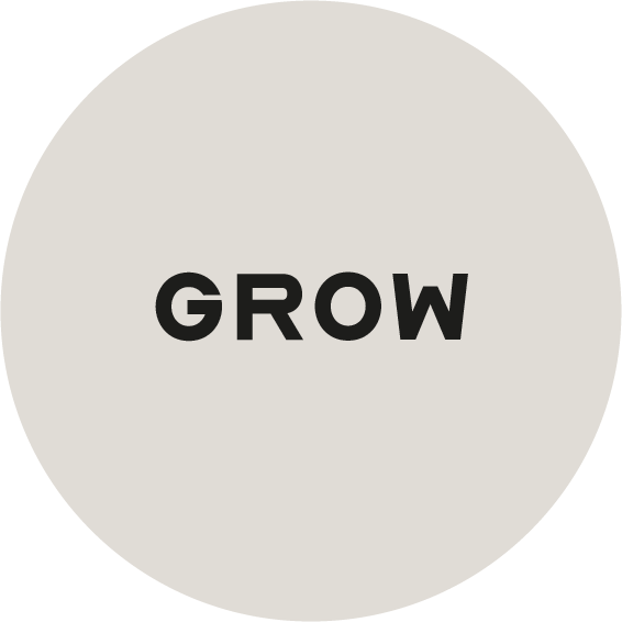 Black text reading 'GROW' centered on a light gray circular background.