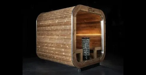 Moderne Sauna aus Holz mit rundem Design und elegantem Saunofen