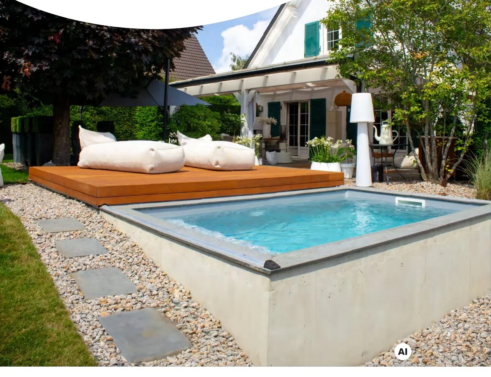 WaluDeck ORIGIN mobile Pool-Terrasse aus Holz mit Lounge-Möbeln über einem eingelassenen Gartenpool