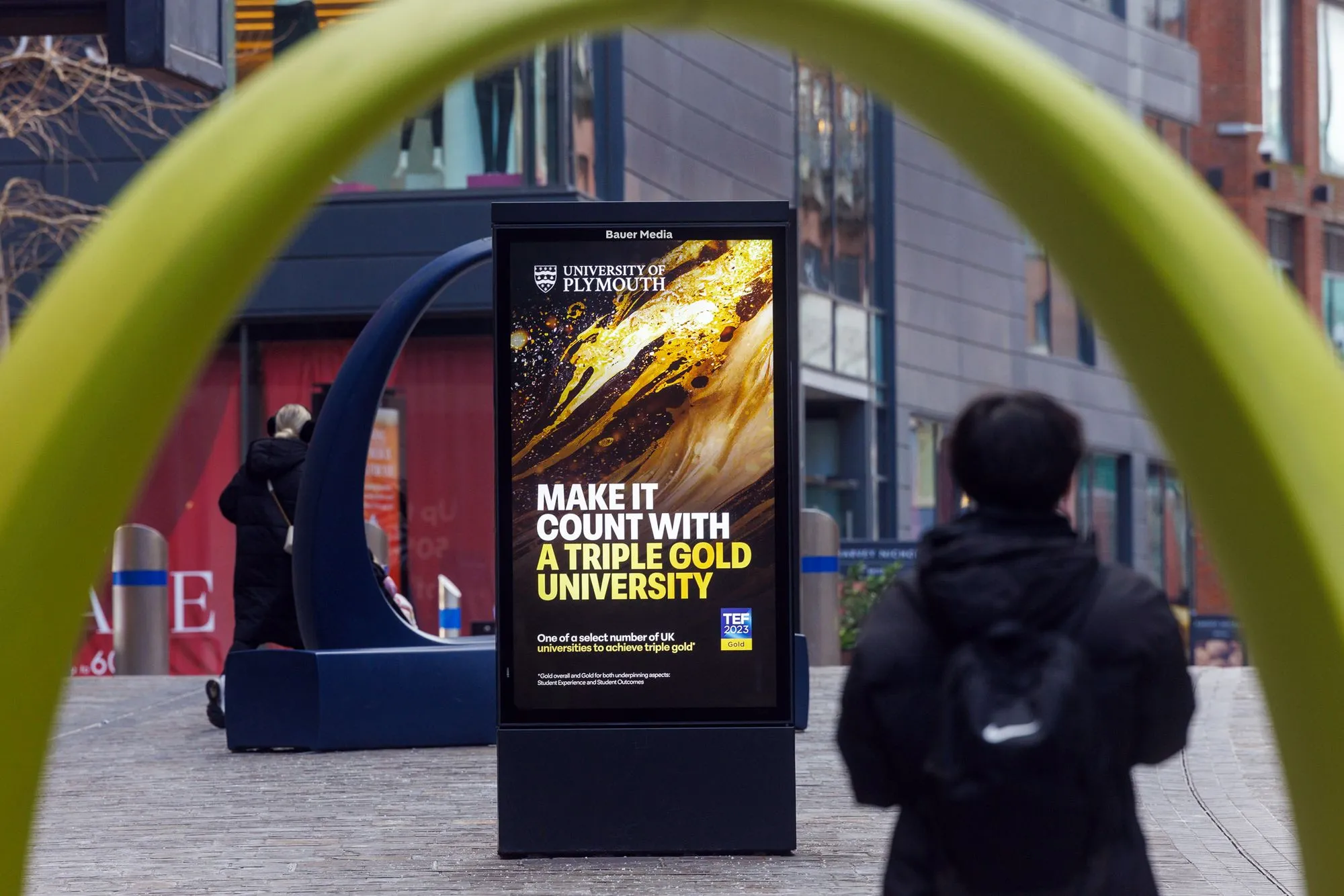 University of Plymouth displaying their OOH ad campaign on an Adshel panel