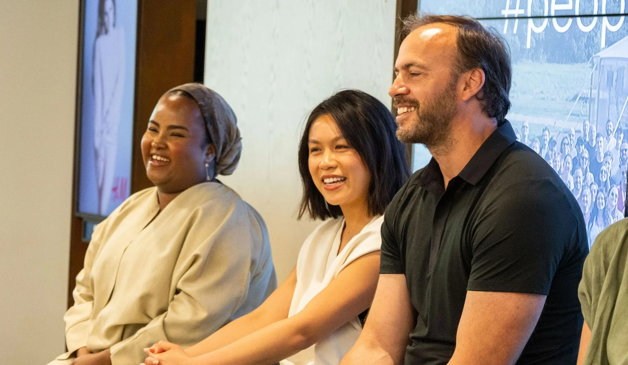 Bauer Media Outdoor CEO Justin Cochrane and other employees at an internal event