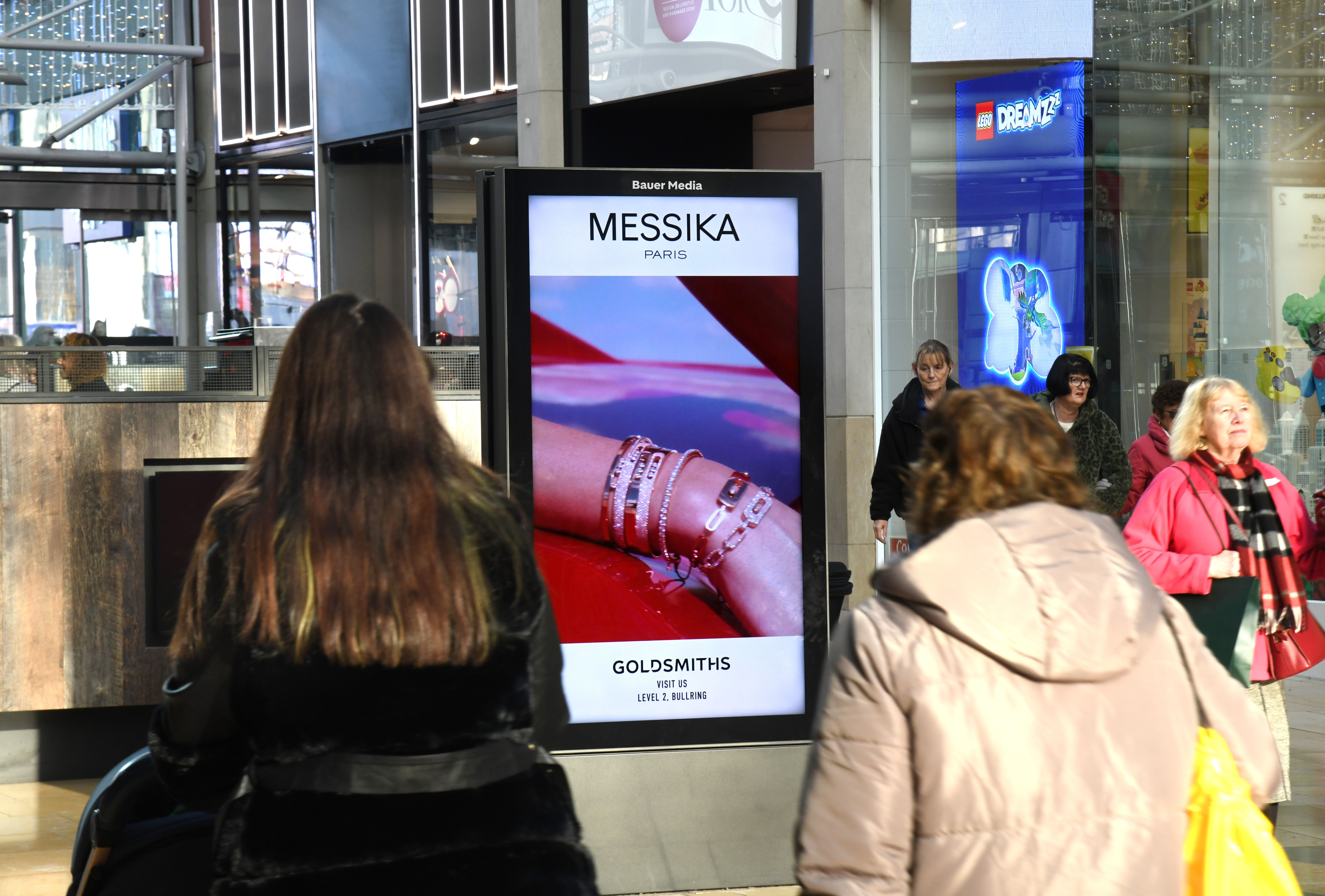 Messika ad campaign displaying on a large digital Malls Live XL screen inside a shopping centre