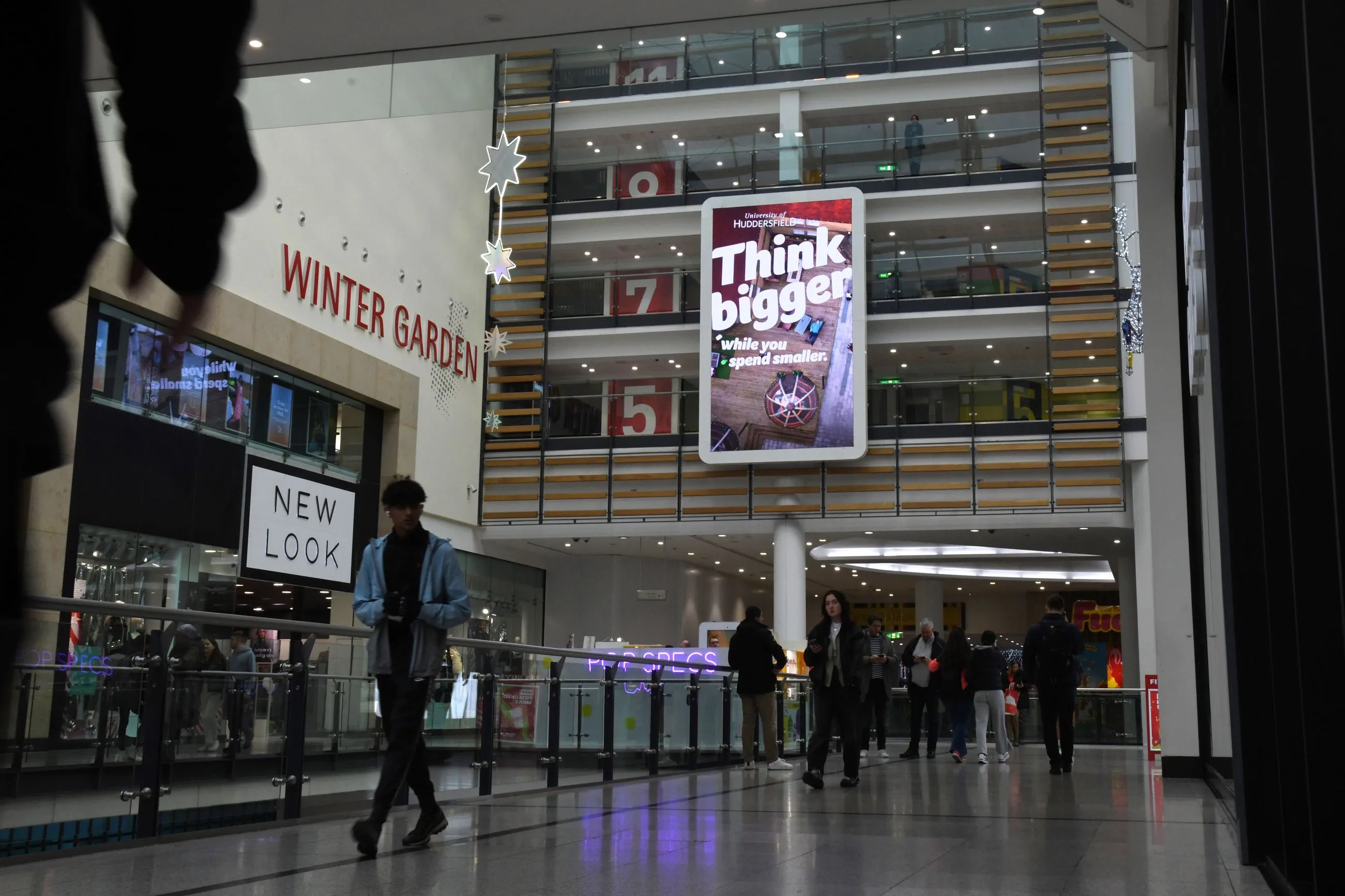 Huddersfield Uni ad campaign on a mega digital shopping mall screen