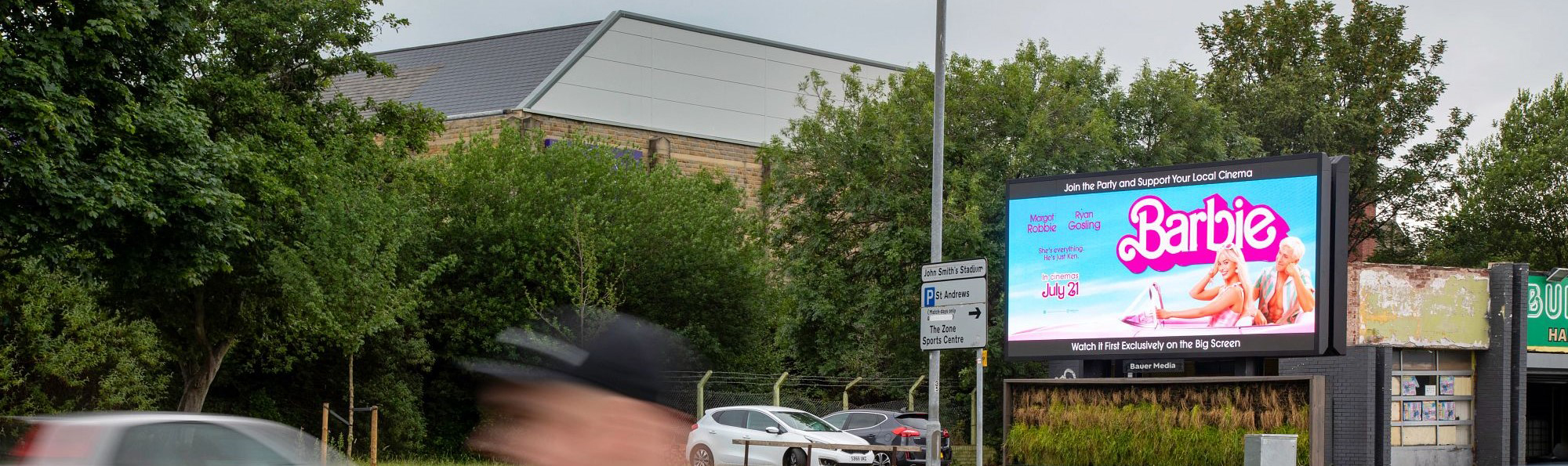 Barbie film displaying on a digital billboard