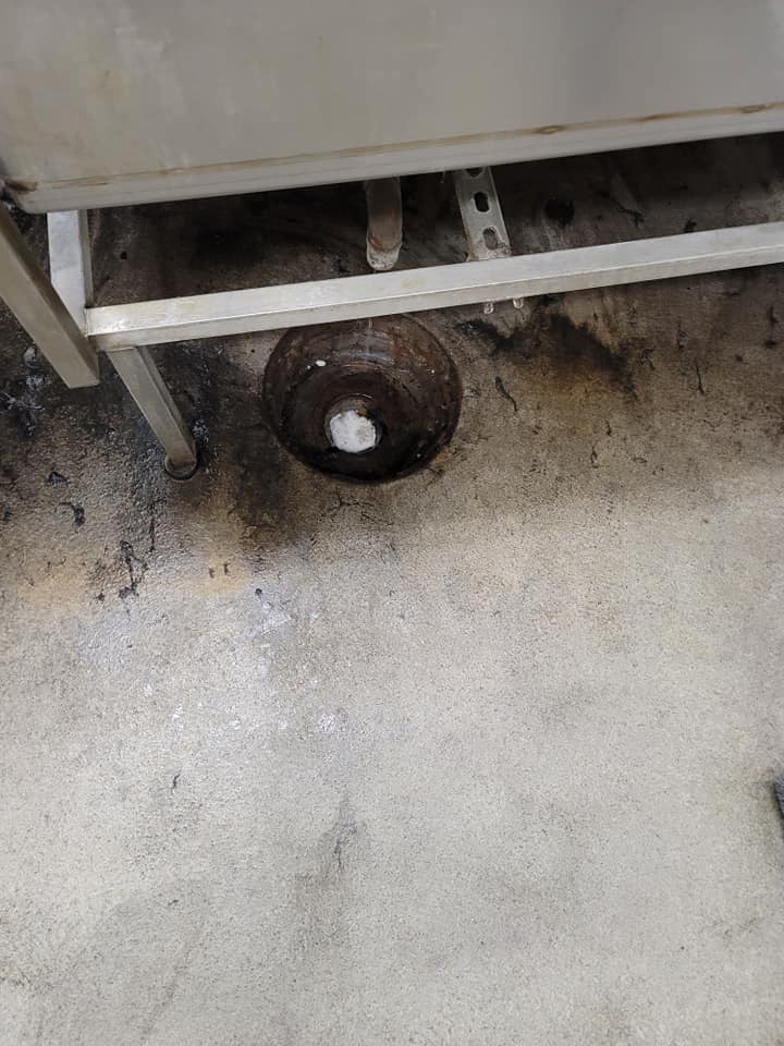 Sewer drain opening prepared for diagnostic camera inspection in Murrieta CA during commercial plumbing service.