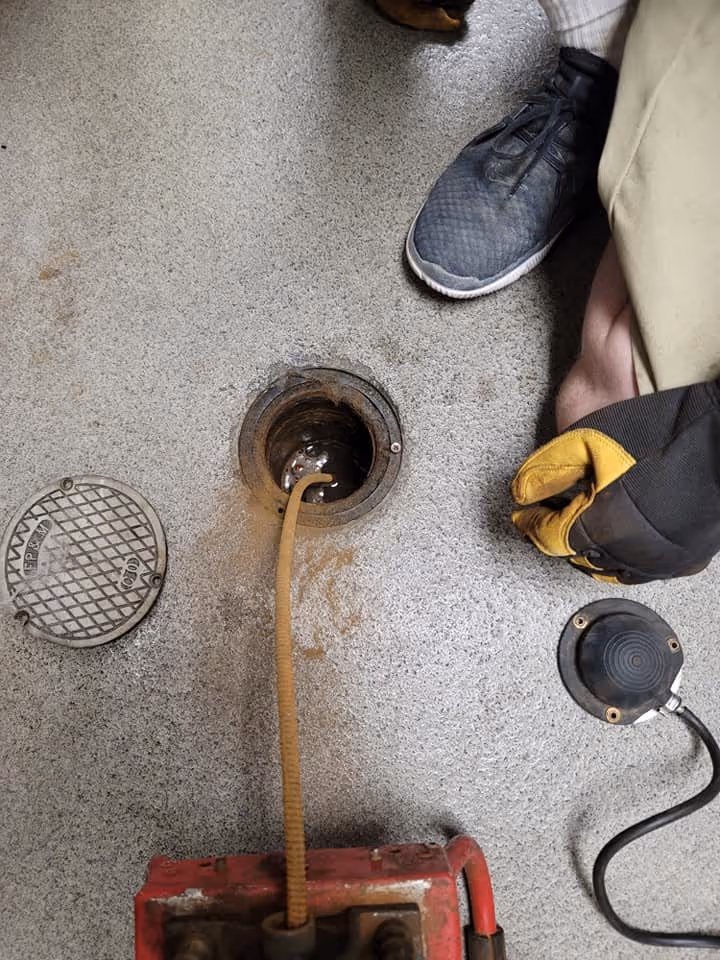 Technician performing a camera inspection in Murrieta, CA, to inspect a drain system.