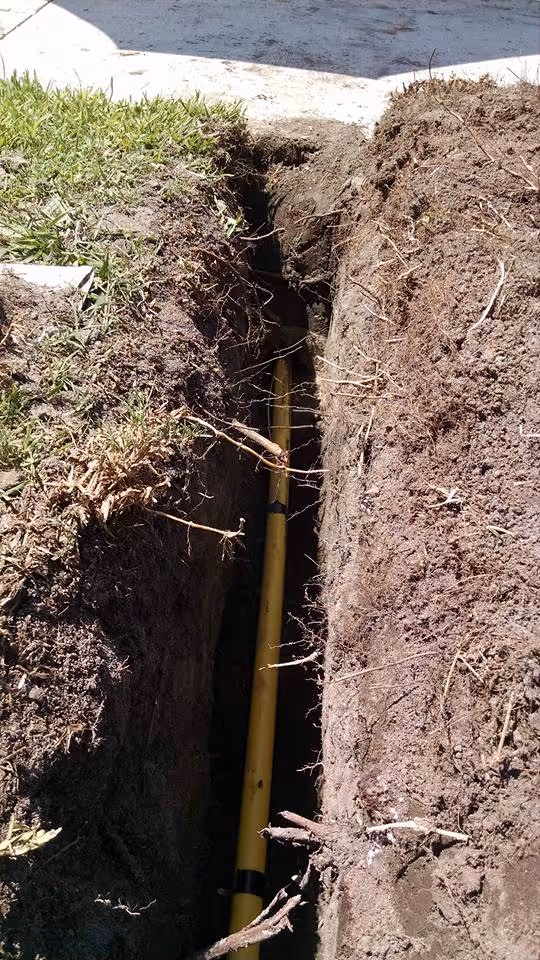 Water line services in Murrieta, CA, with a new yellow pipe being installed.