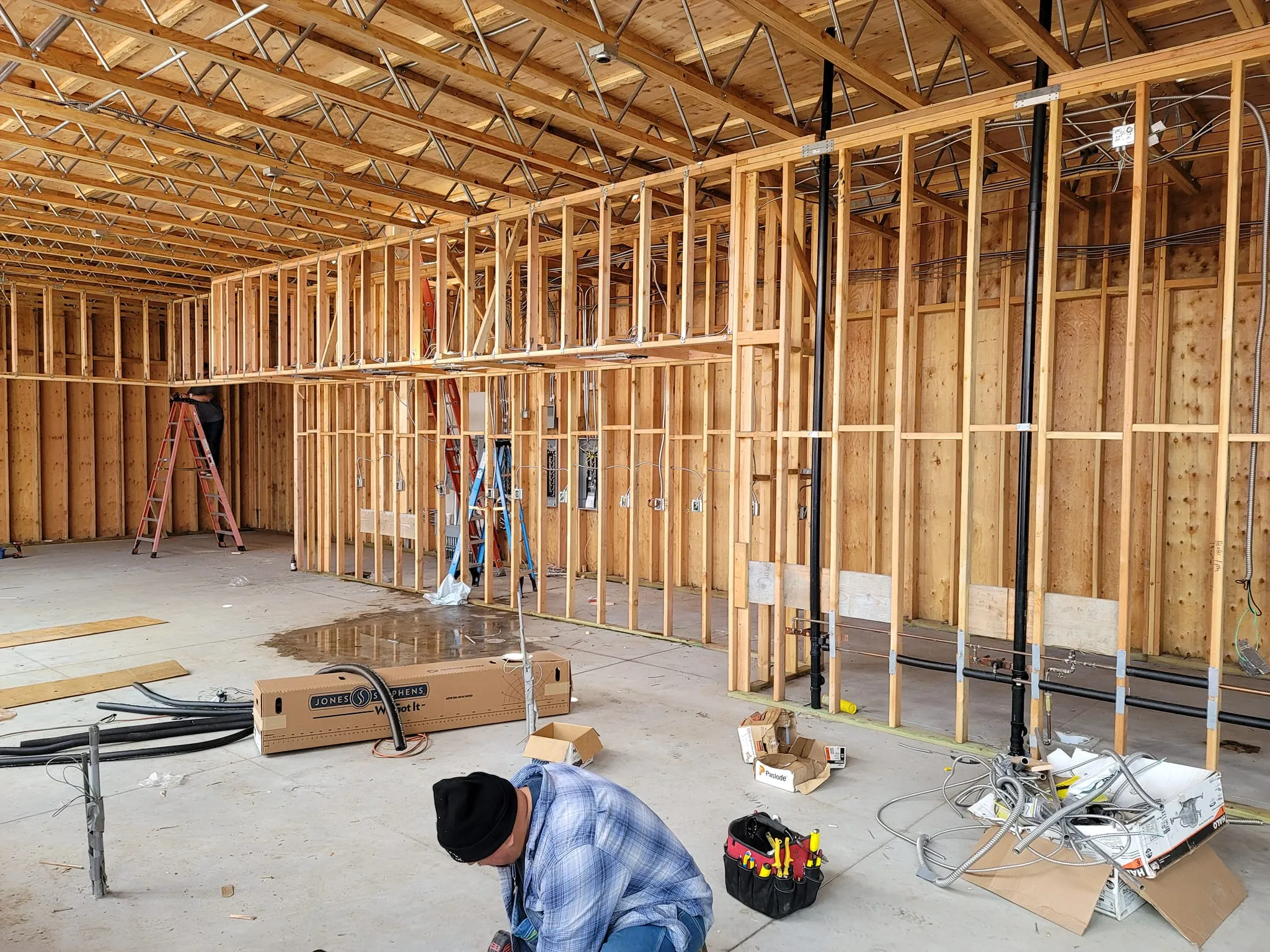 Plumber in Temecula Valley, CA, featuring pipe installations and construction framing for plumbing systems.