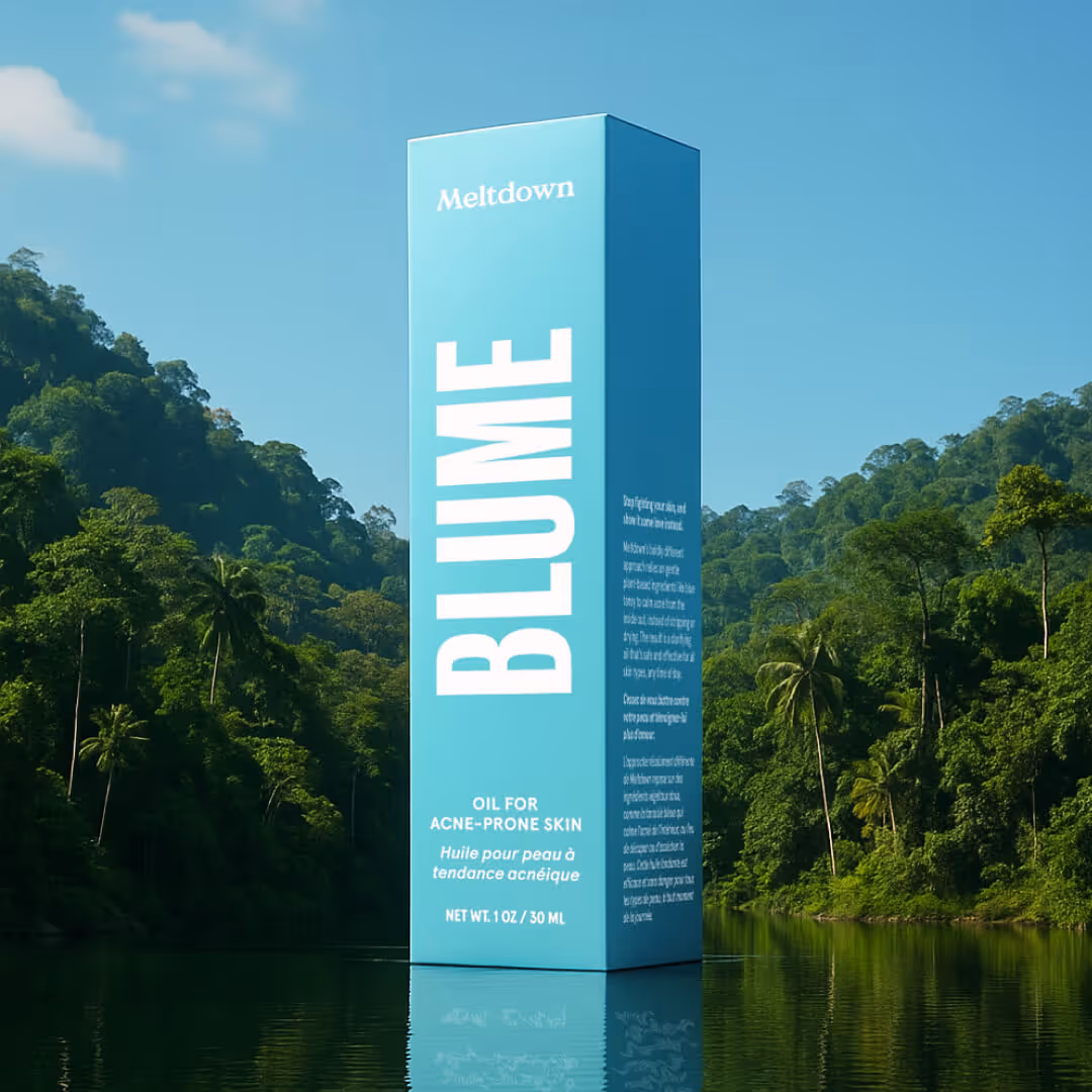 Tall blue rectangular box of Blume Meltdown acne-prone skin oil standing on calm water with green forest and clear sky background.