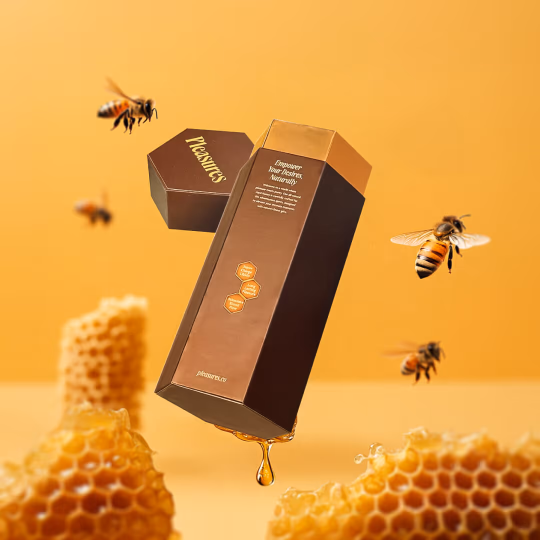 Hexagonal brown product box labeled 'Pleasures' with honey dripping and bees flying around honeycomb pieces.
