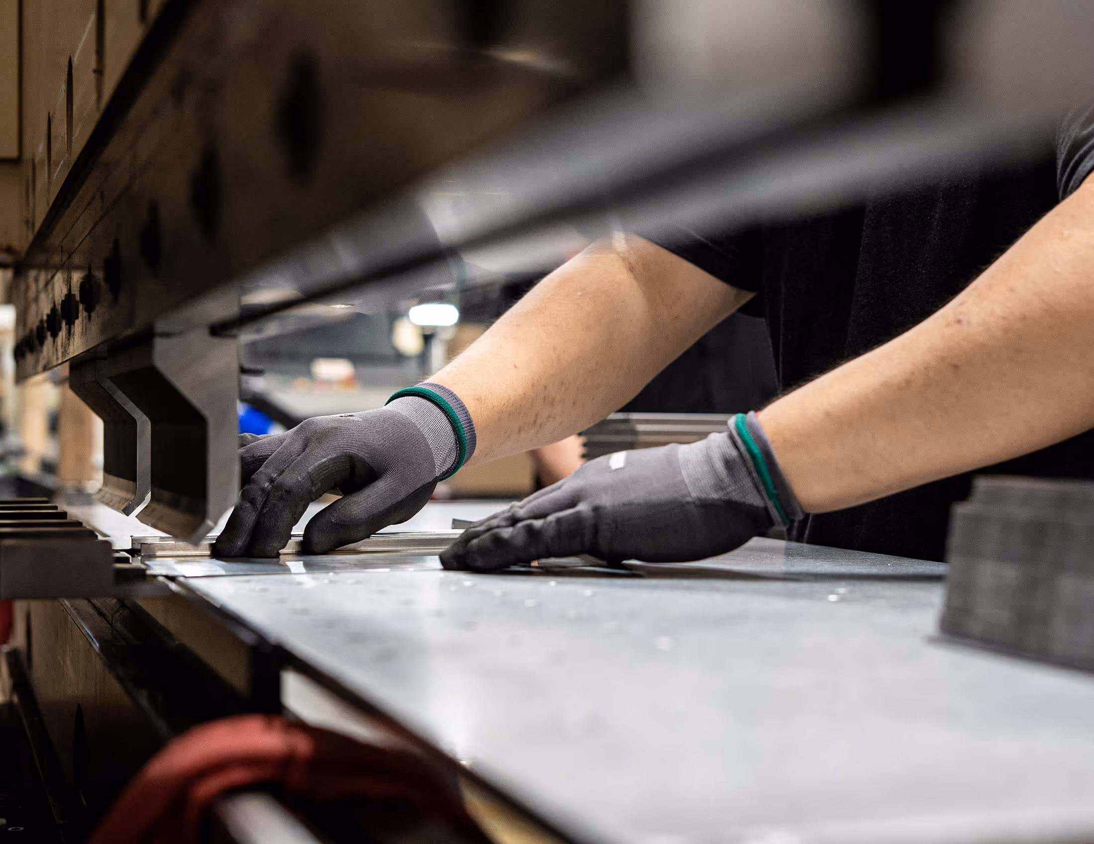 Employee working on racks in the shop