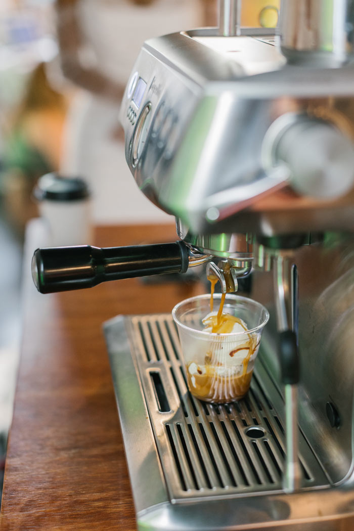 Espresso pouring over ice cream to make an affogato at the Sunkissed Brew mobile coffee cart