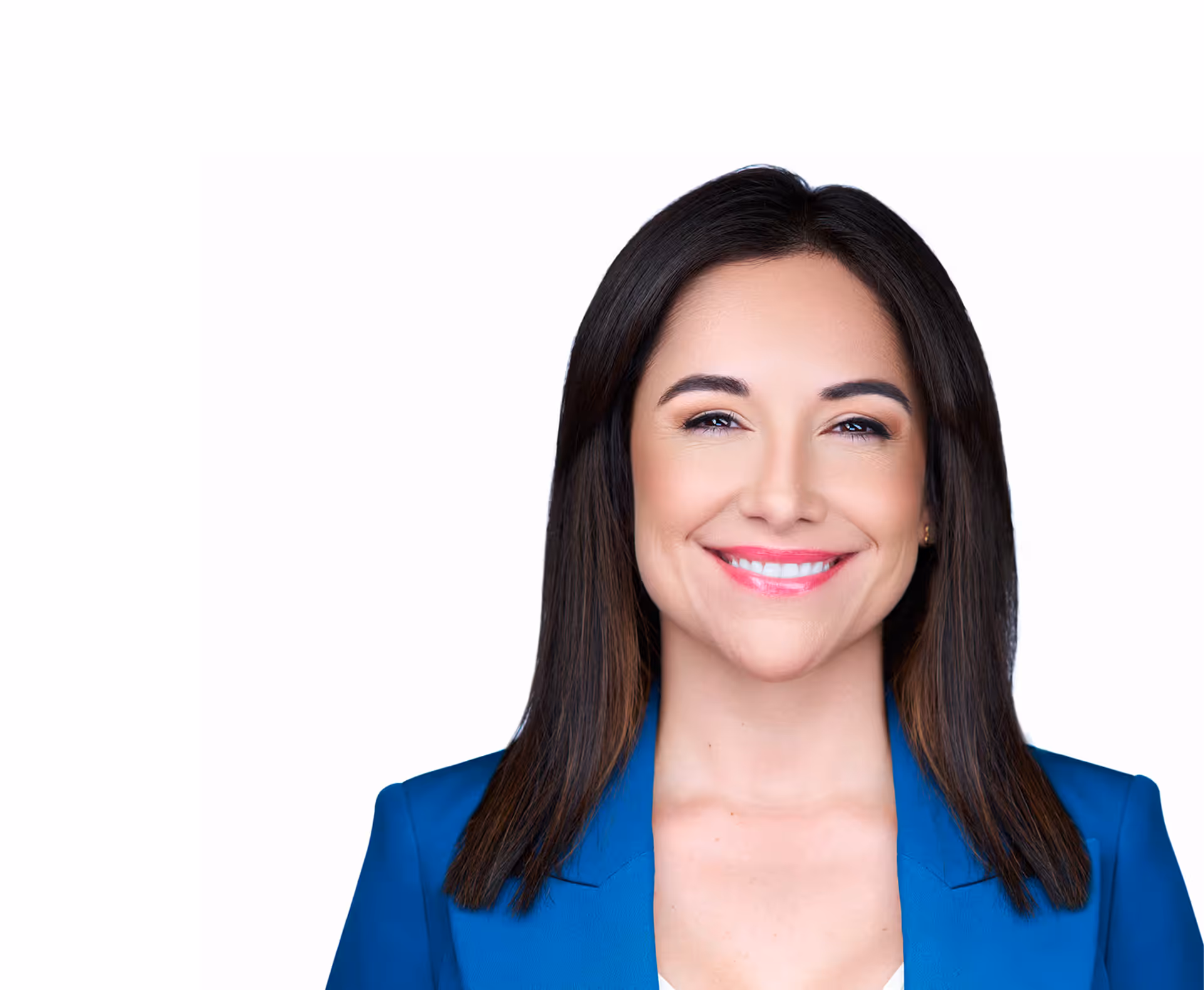 Smiling woman with dark hair wearing a blue blazer against a white background.