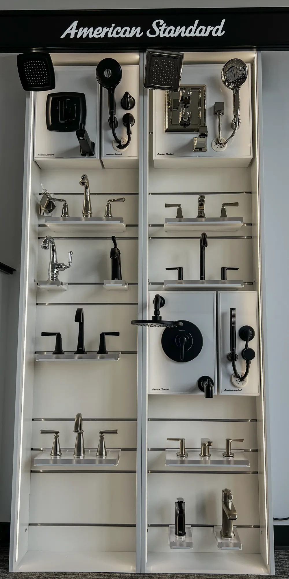Bathroom hardware and fixture selection wall in The Water Closet Bozeman showroom