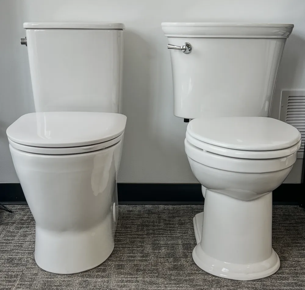 Modern toilet display pair inside The Water Closet Bozeman showroom