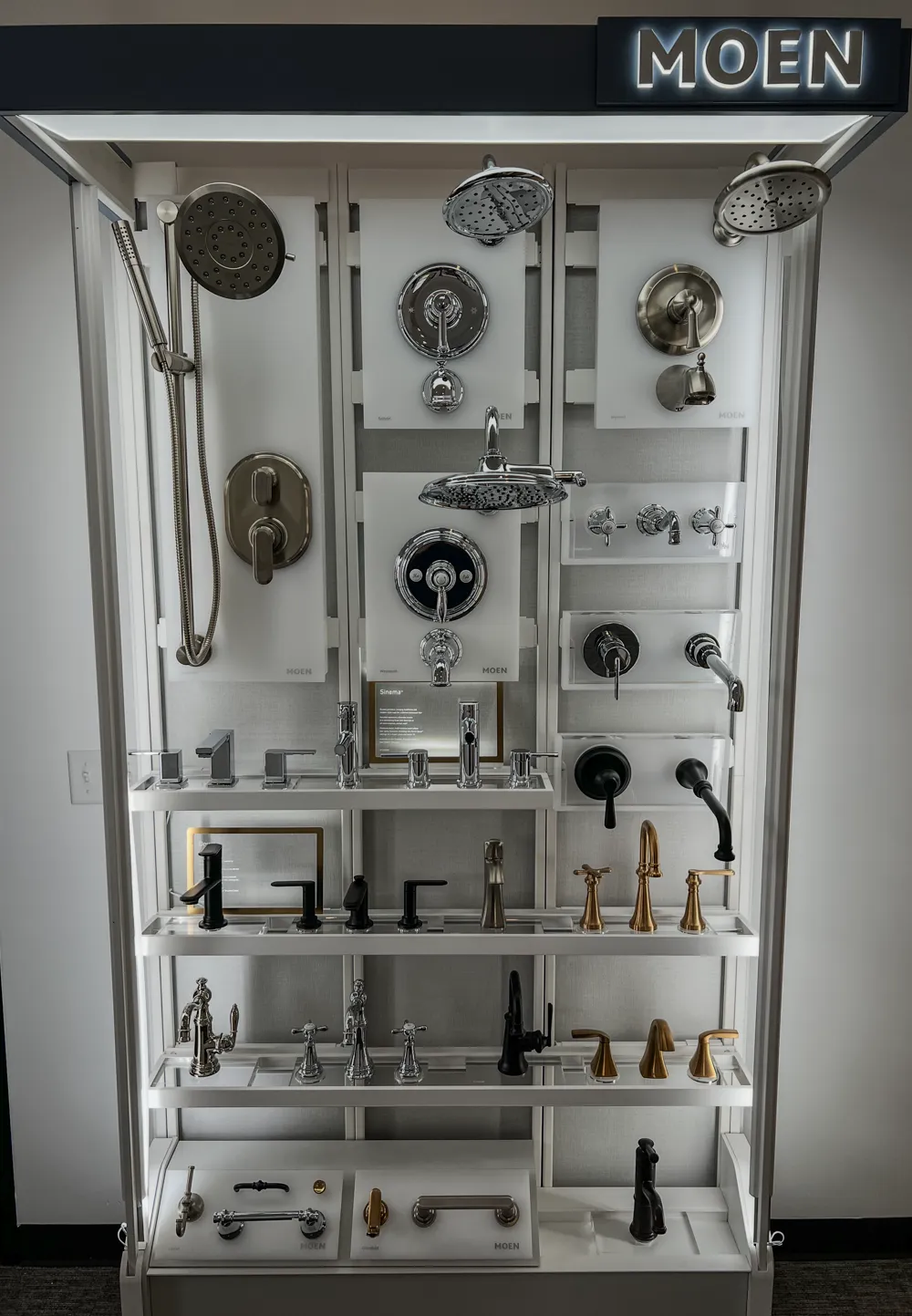 Faucet and shower fixture display panel in Bozeman location showroom