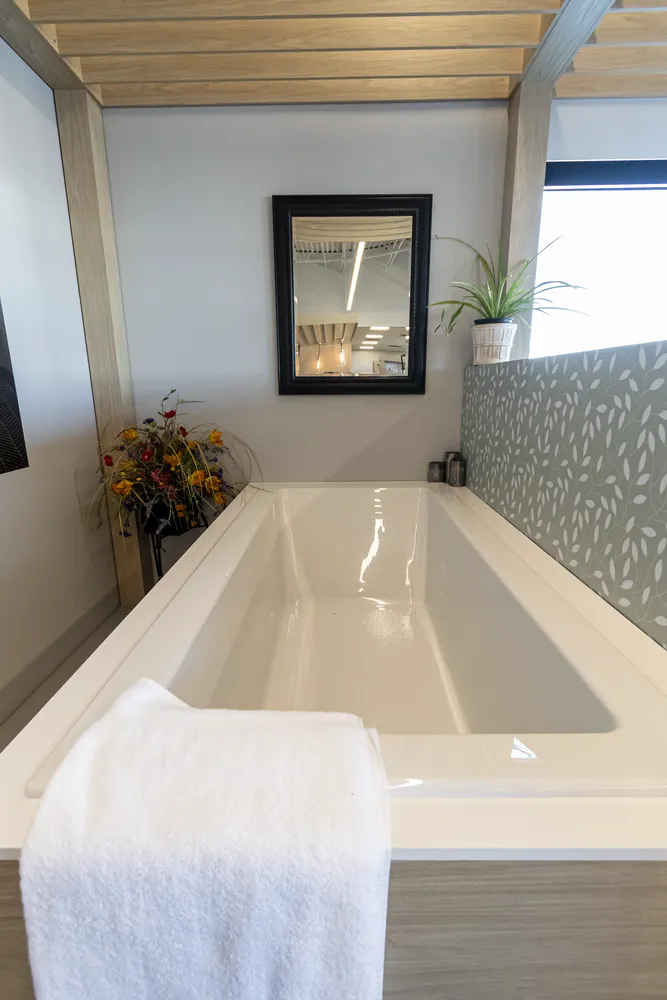 Modern freestanding tub display in The Water Closet Billings showroom