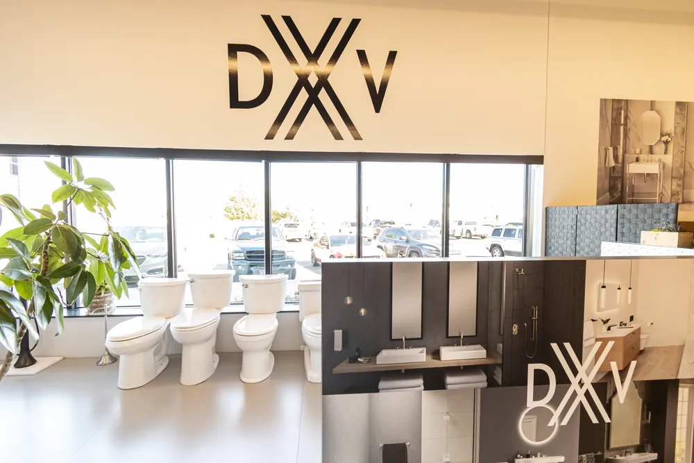 Front showroom space with The Water Closet logo in Billings location