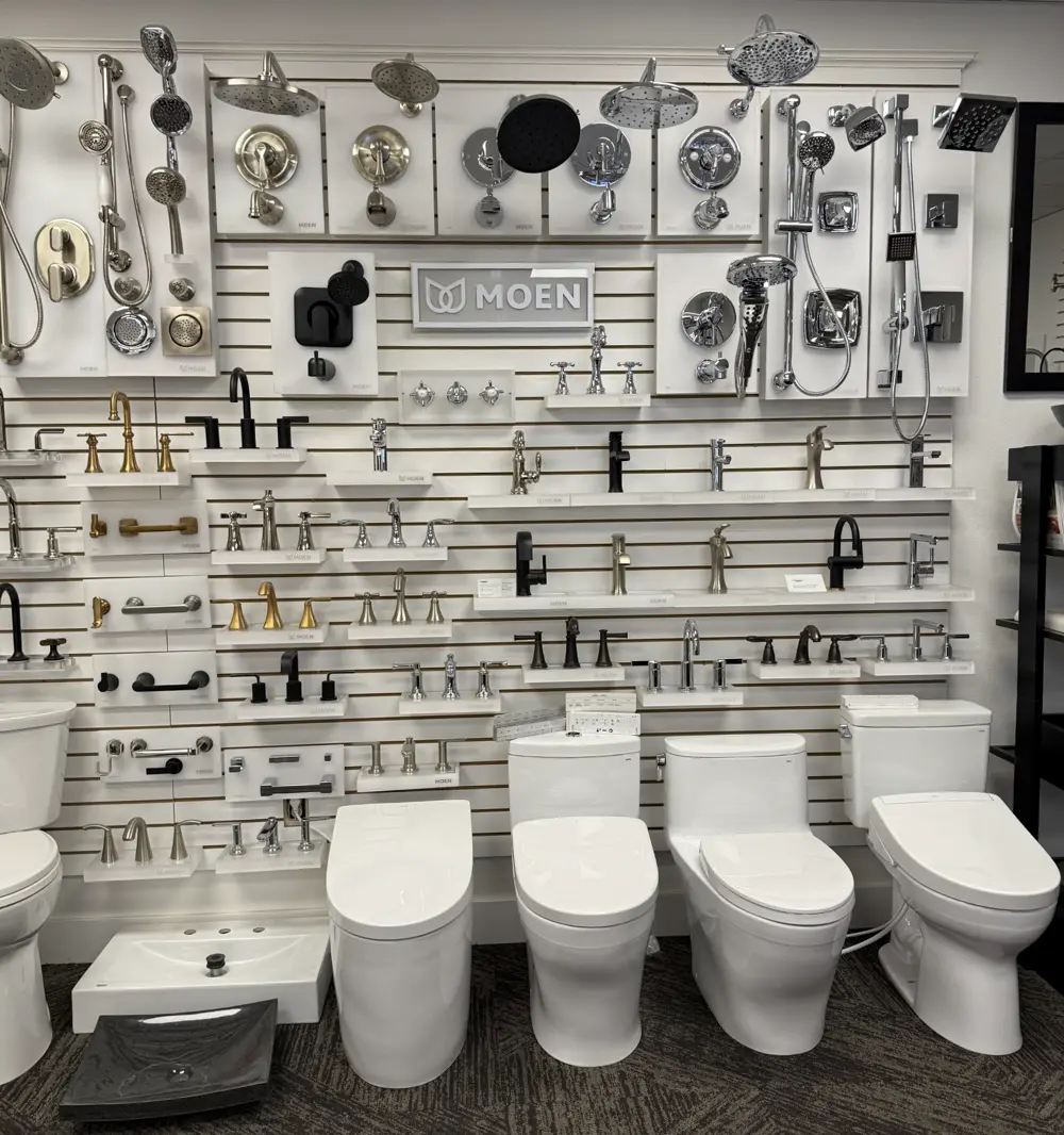 Toilet display wall with bathroom fixtures in The Water Closet Kalispell showroom