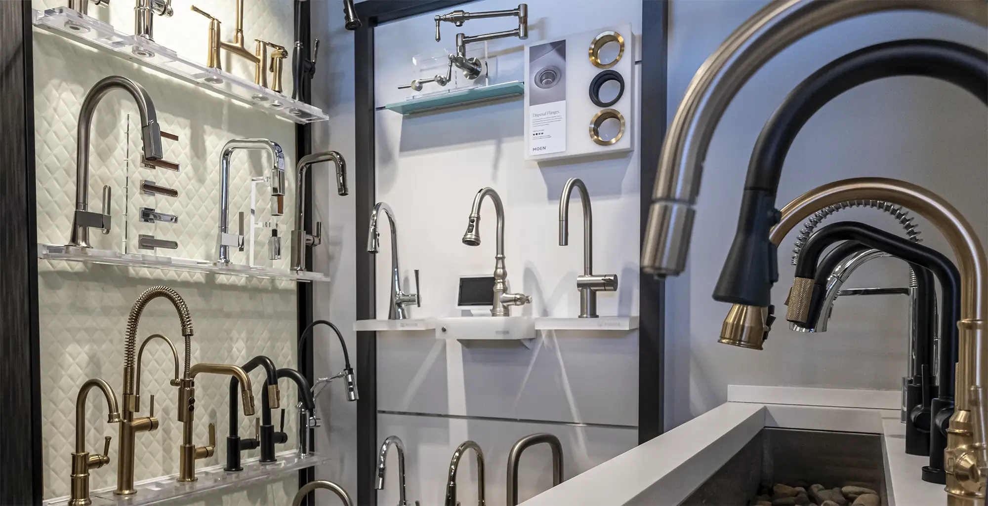 Luxury kitchen and bathroom faucet display wall in The Water Closet showroom