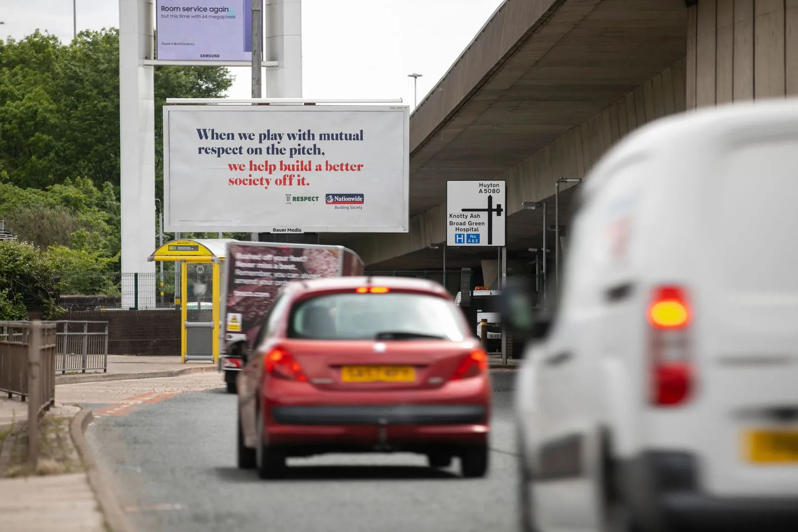 Nationwide's Billboard advertisement with car travellers driving past