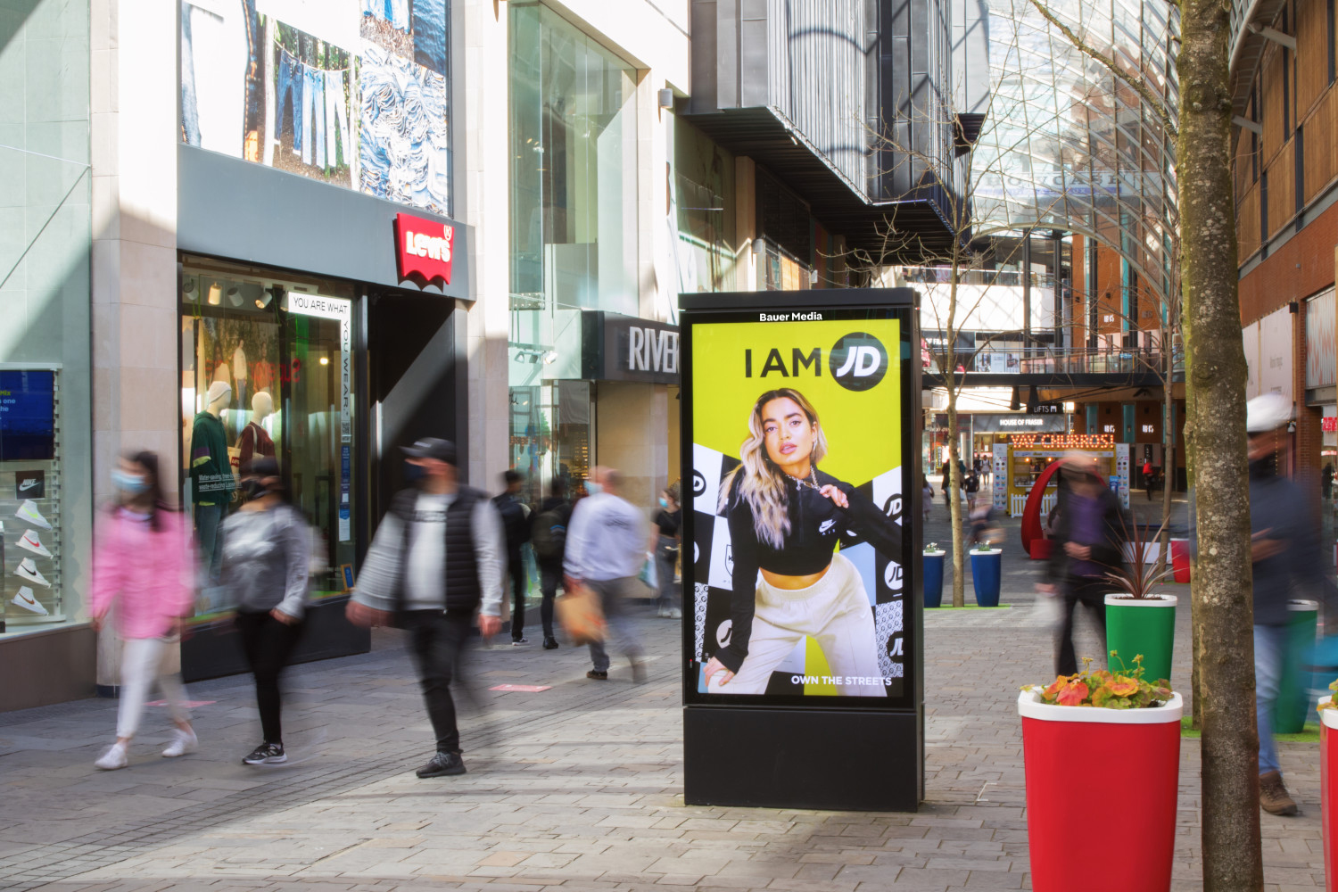 JD Sports advertising on a digital screen outdoors