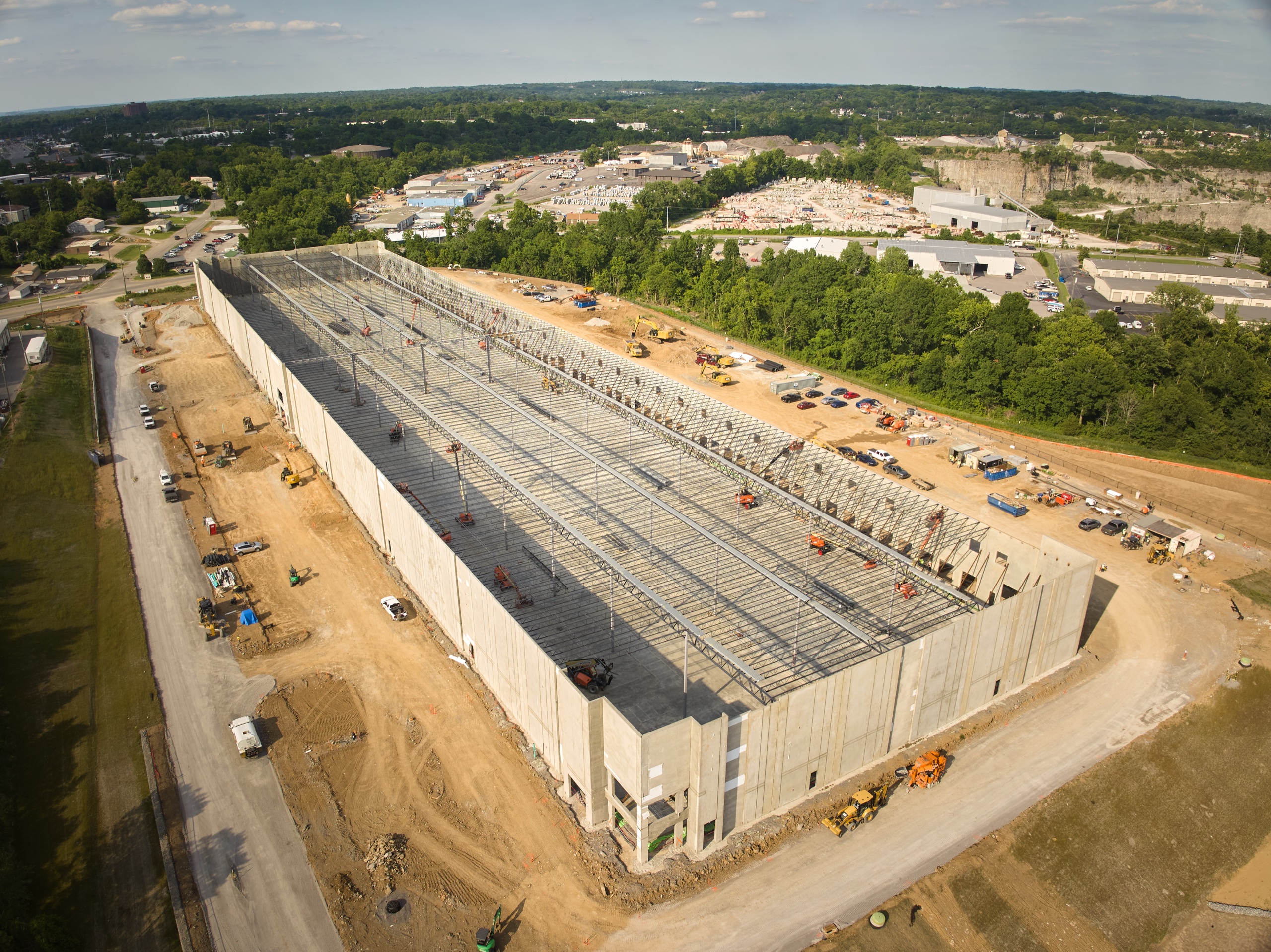 Aerial view of steel rising inside the tilt-up concrete shell on a Cooper Construction commercial build in Hermitage, Tennessee