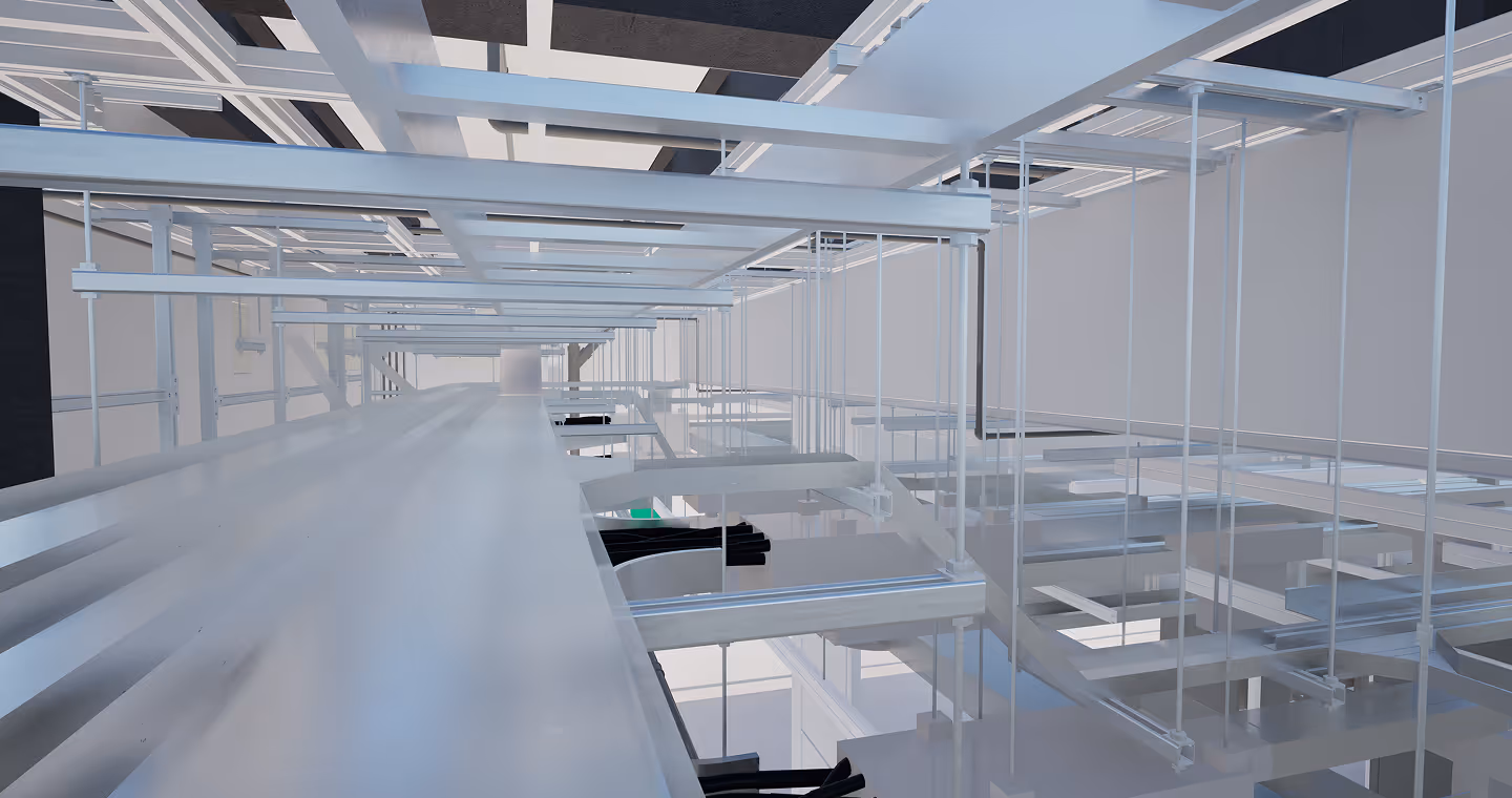 3D BIM model showing white suspended cable trays and ceiling structure in a large industrial or data center facility.