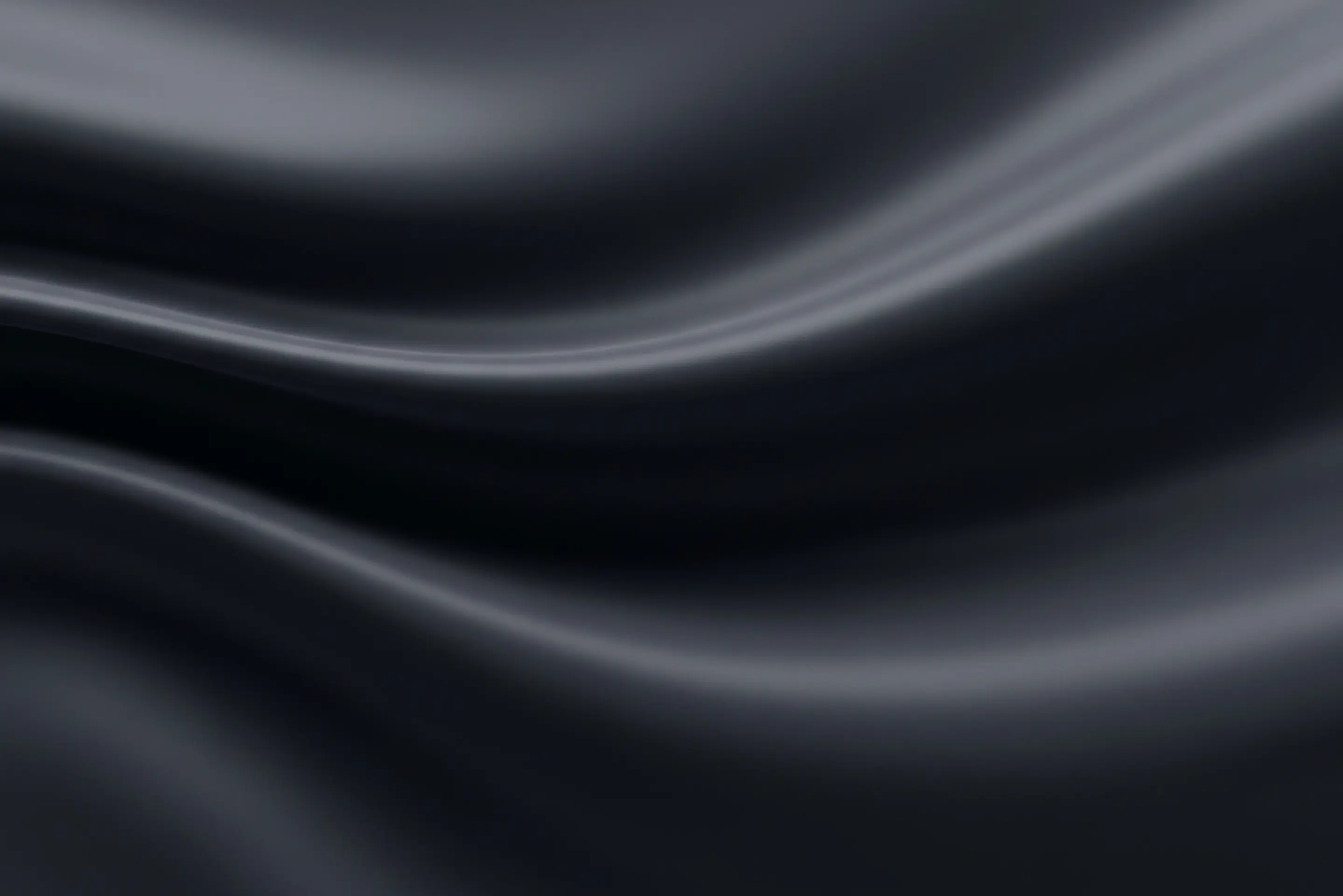 Abstract white and light gray curved lines creating a flowing, wave-like pattern.