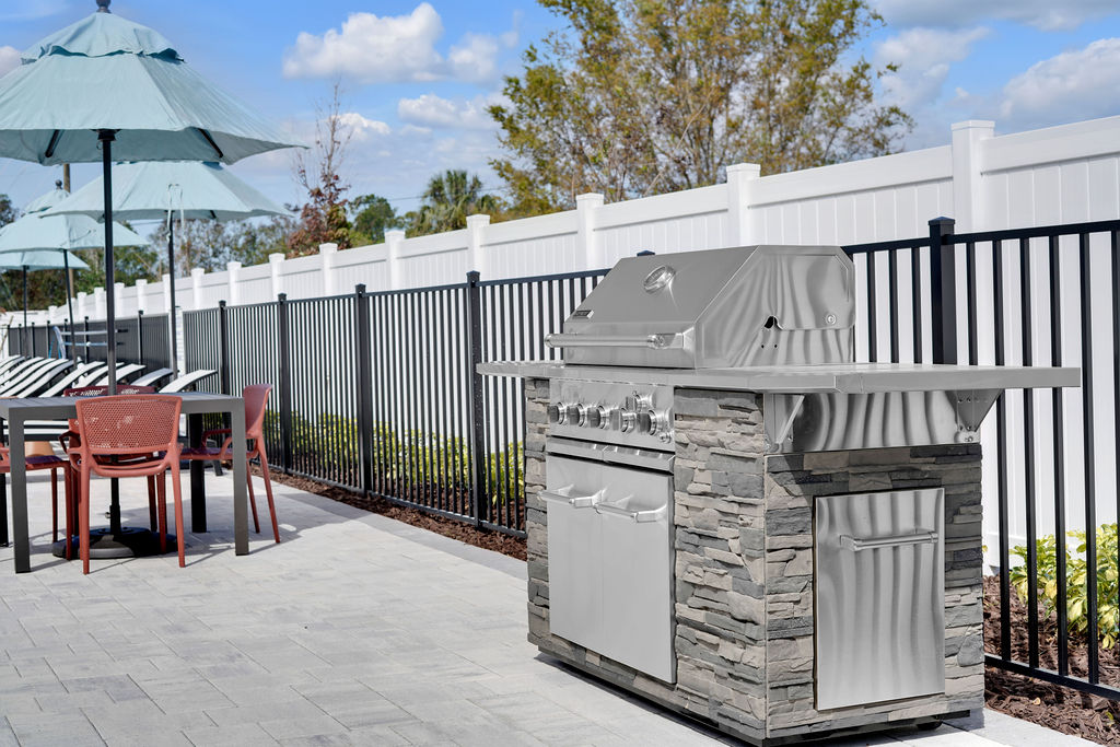 Outdoor grill on pool deck image