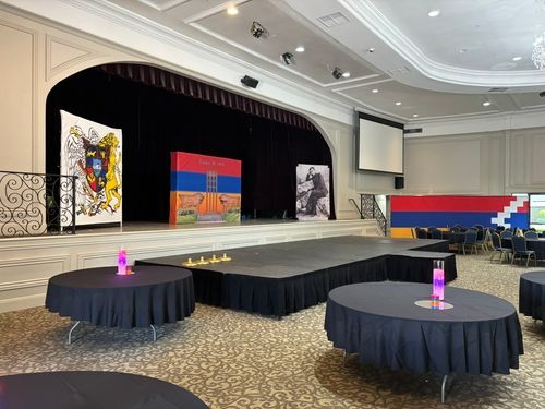 28 x 12 x 2 Steel Deck Stage with skirt, stairs, and safety rail in Orange county.