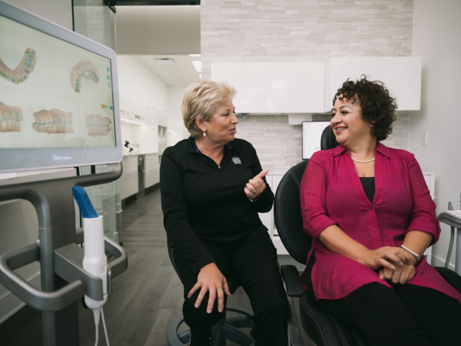 Dentist and patient in consultation during professional dental care visit