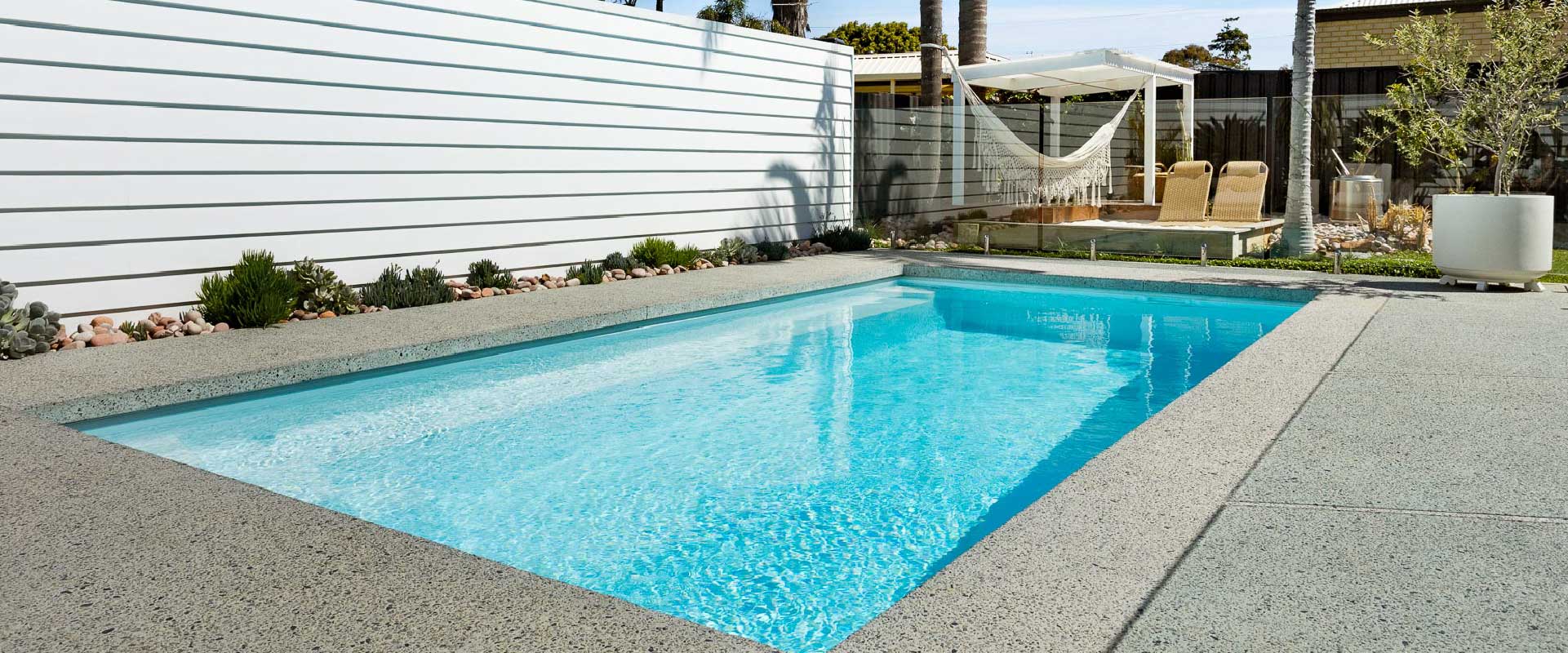 Stradbroke 7m fibreglass pool in Polo White installation, wide view
