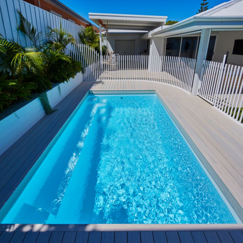 Looking down the length of a Hamilton Slimline 5.5m pool in Polo White