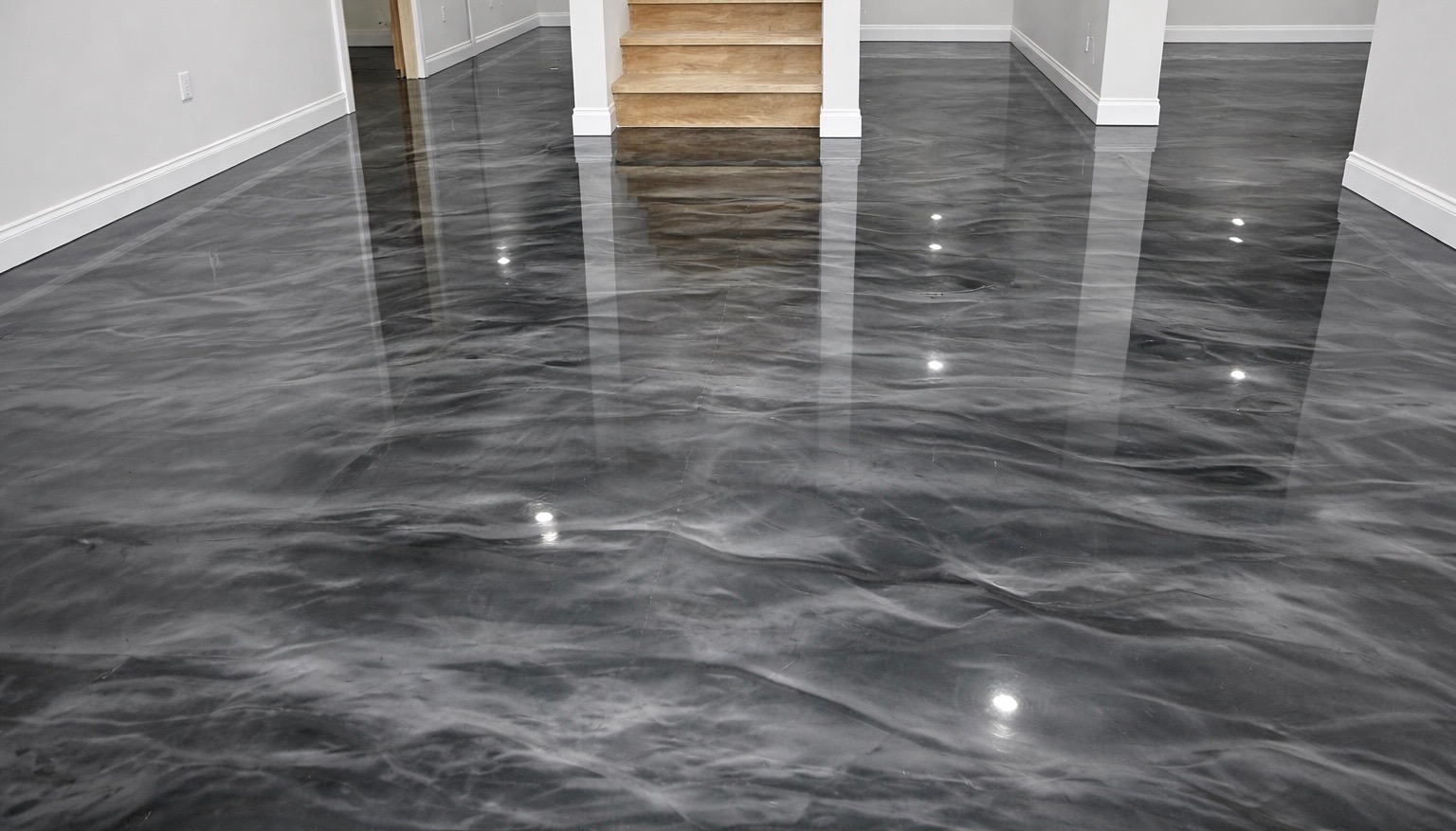 image of a basement floor with custom gray epoxy