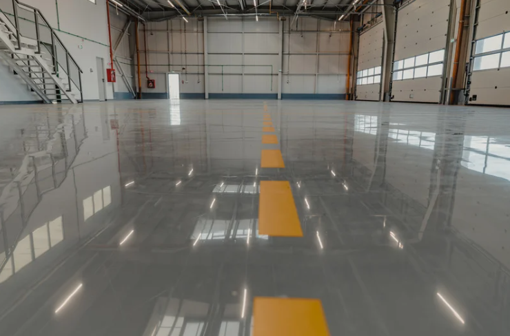image of epoxy flooring with yellow line painting to be driven on