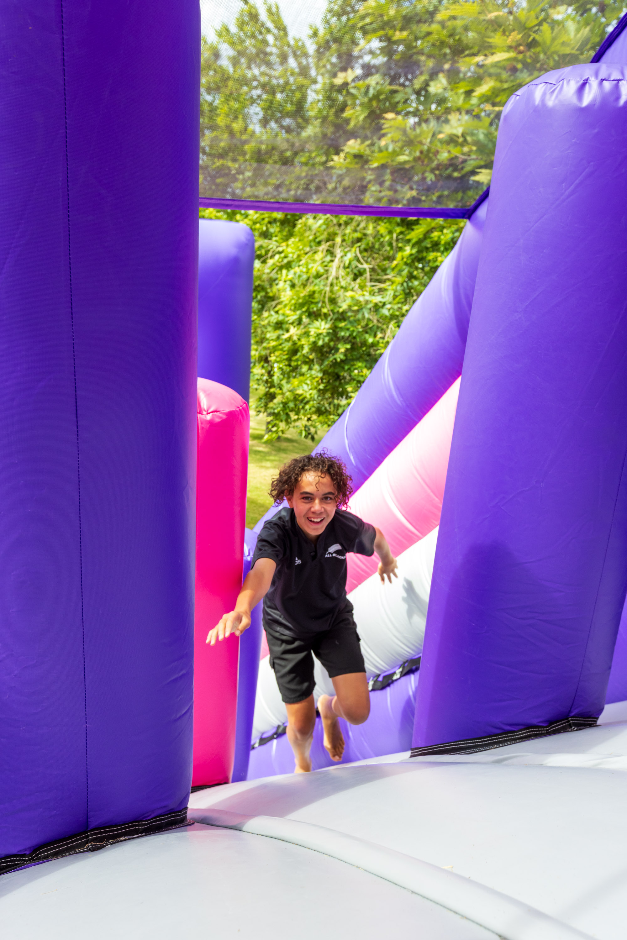 We inspect, test, and secure every inflatable before the first participant steps on course.