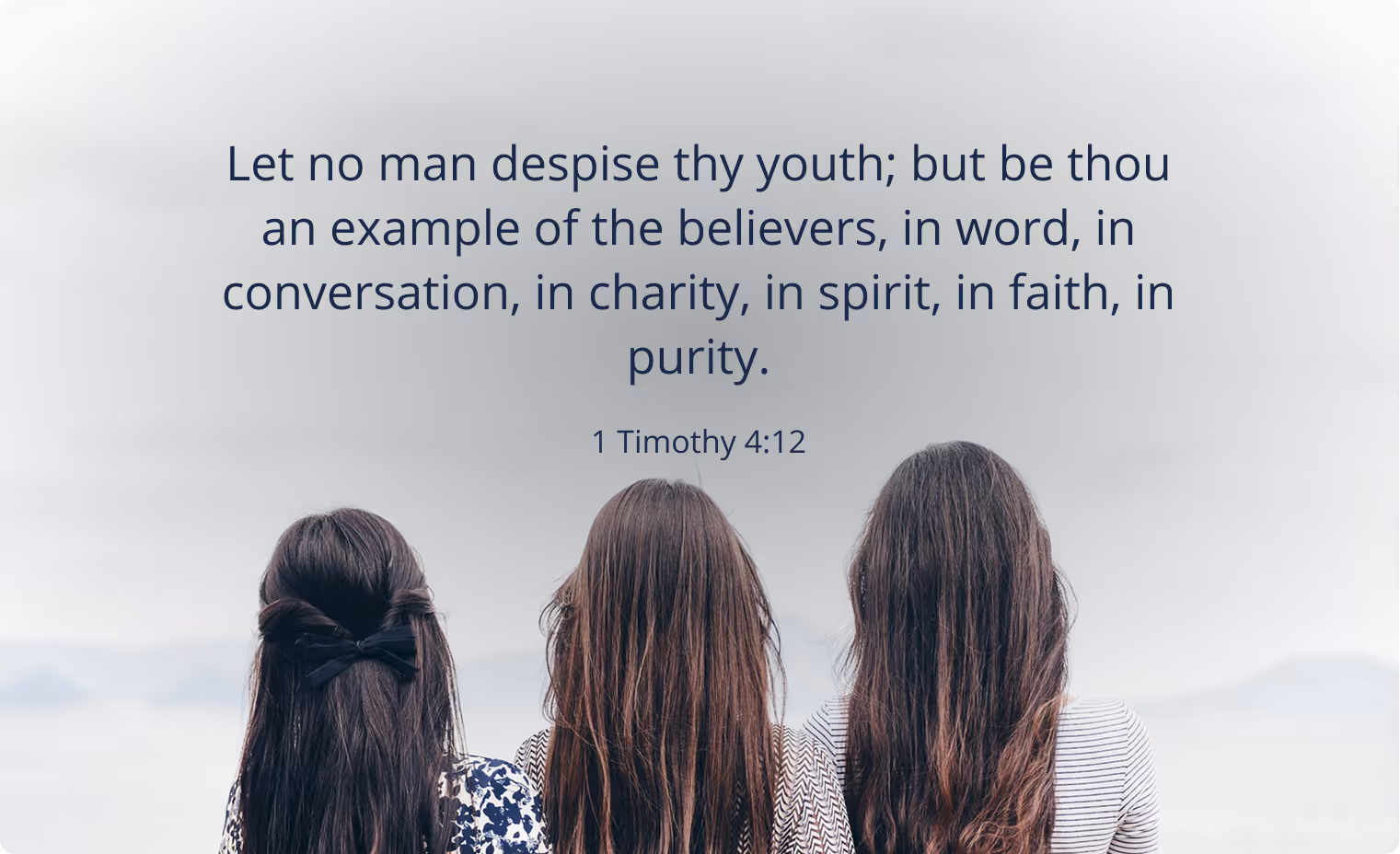 Bible verse from 1 Timothy 4:12 over a background of three girls with long hair sitting side by side facing away.