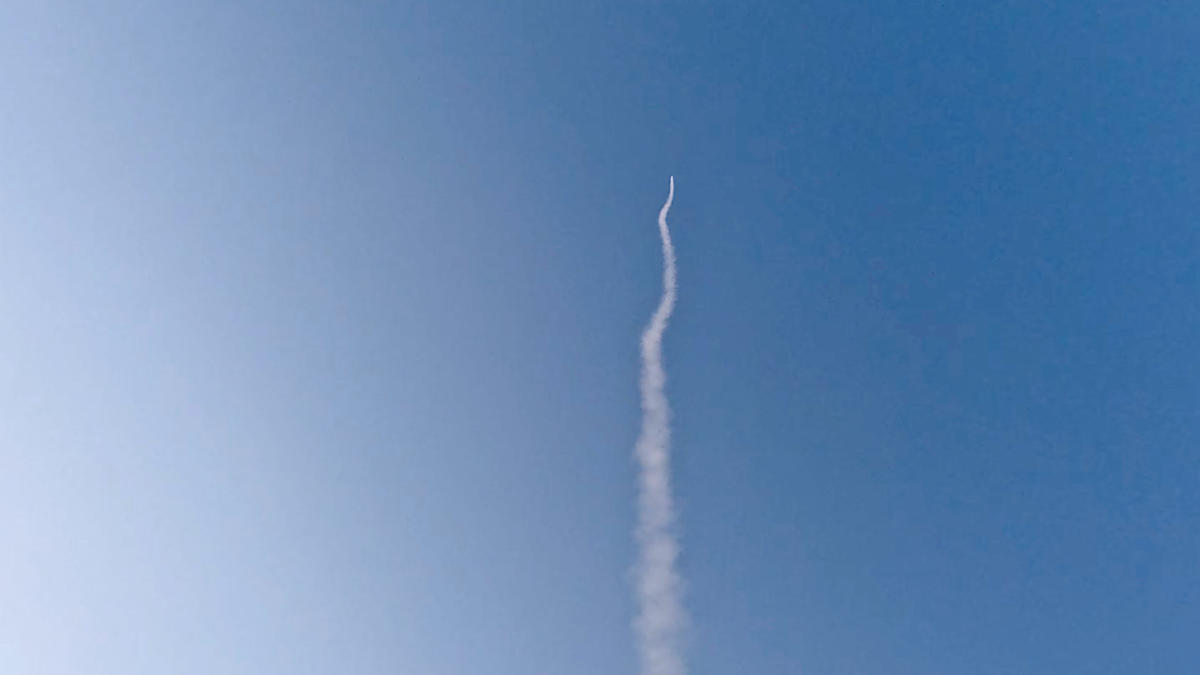 Estes rocket soars into the sky
