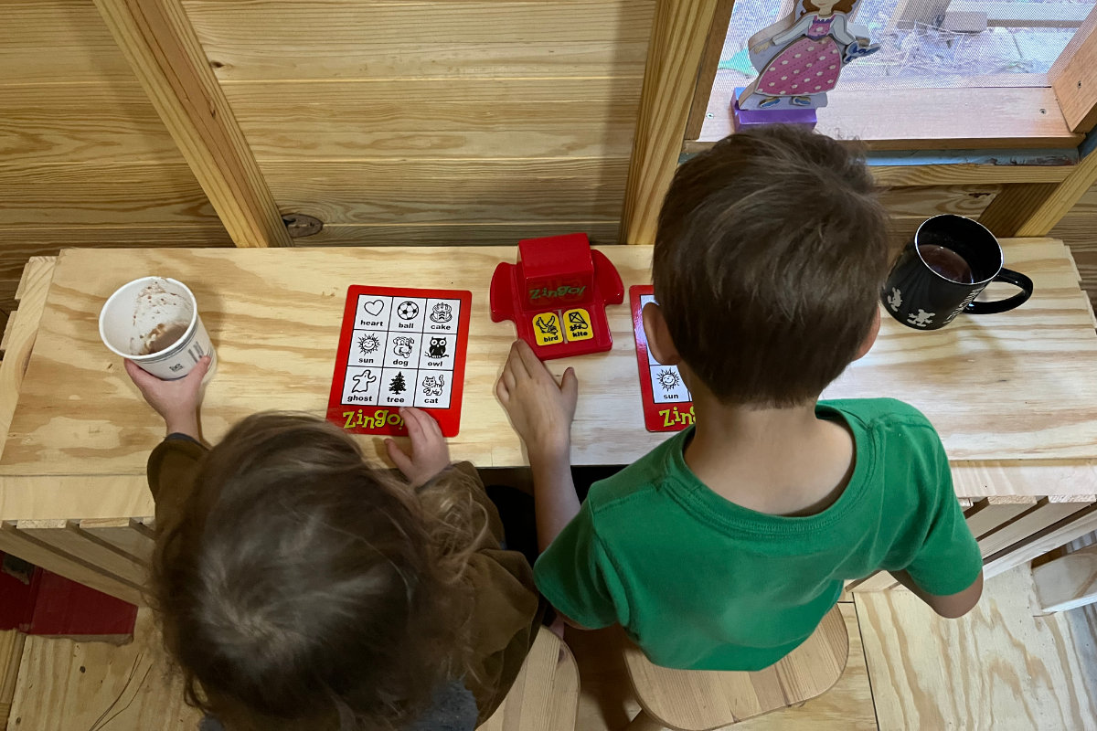 kids playing games in treehouse
