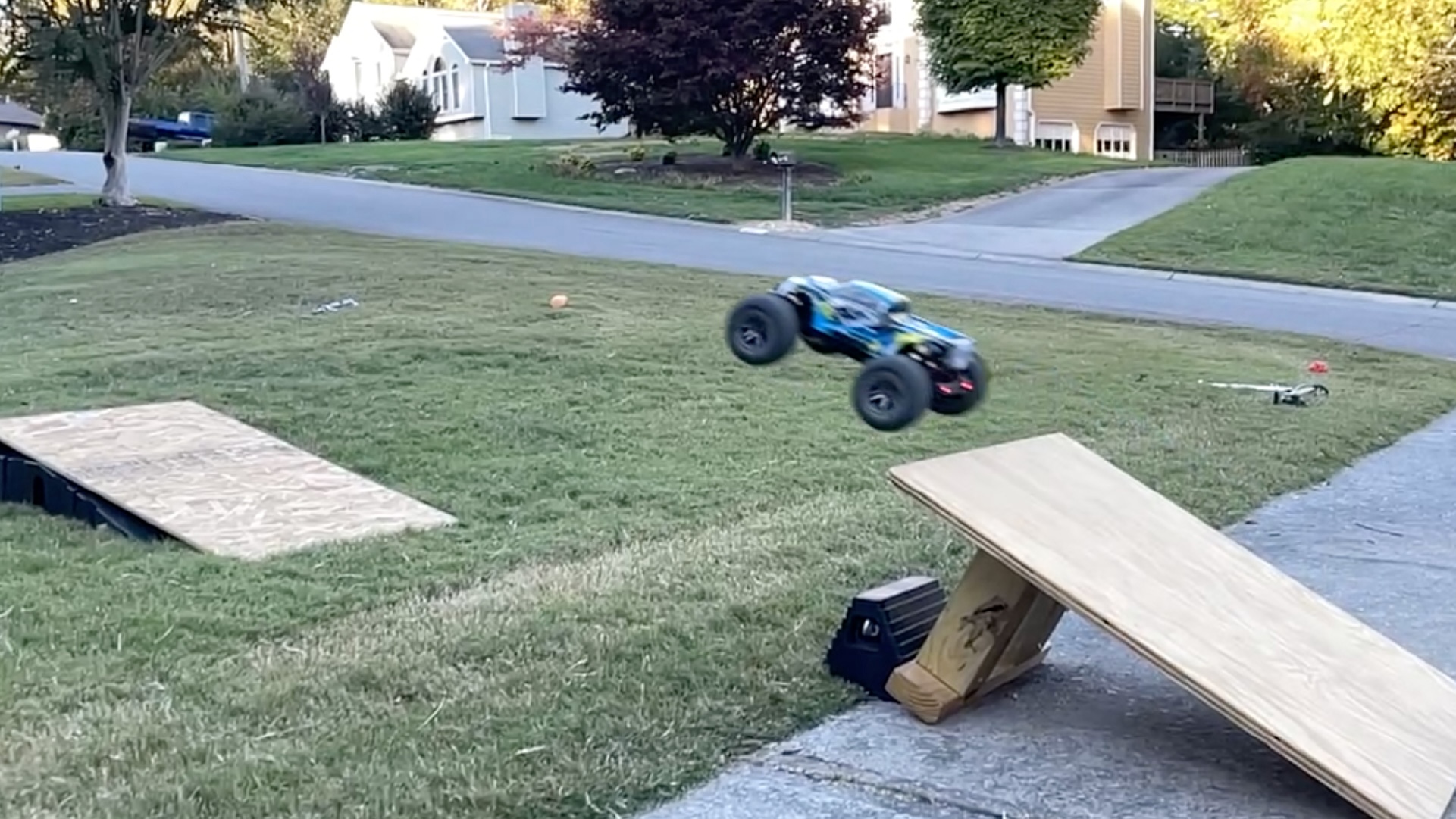 An RC car flies off a jump