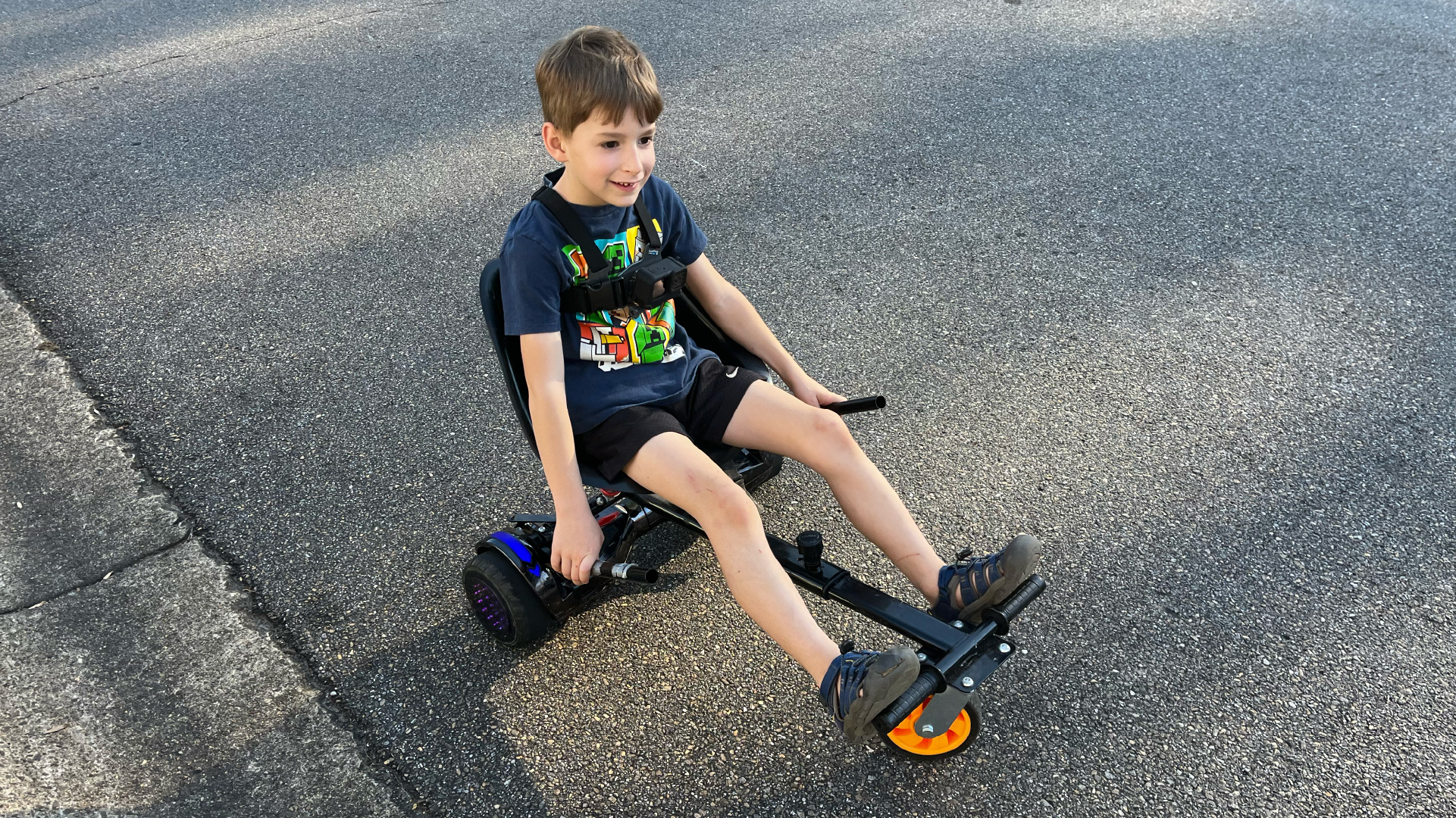 Boy on a hoverboard go-kart
