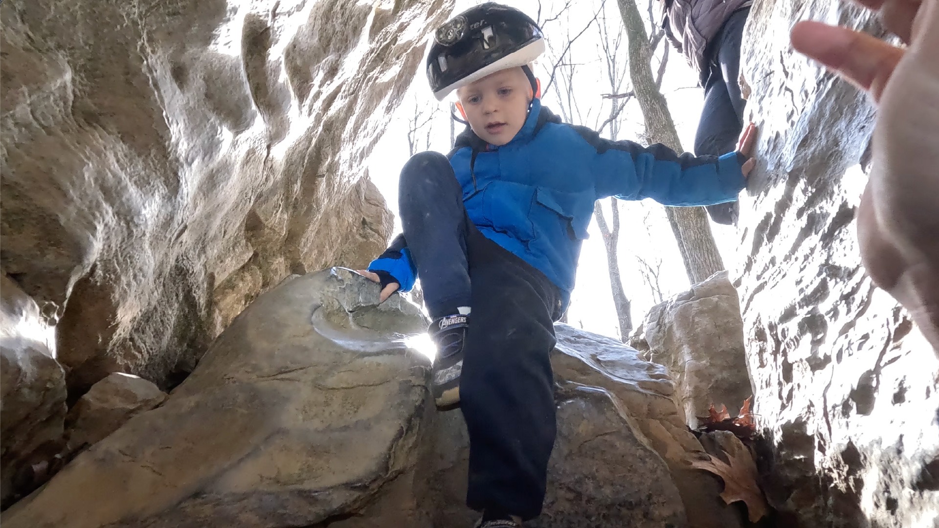 Boy enters Pettyjohn's Cave
