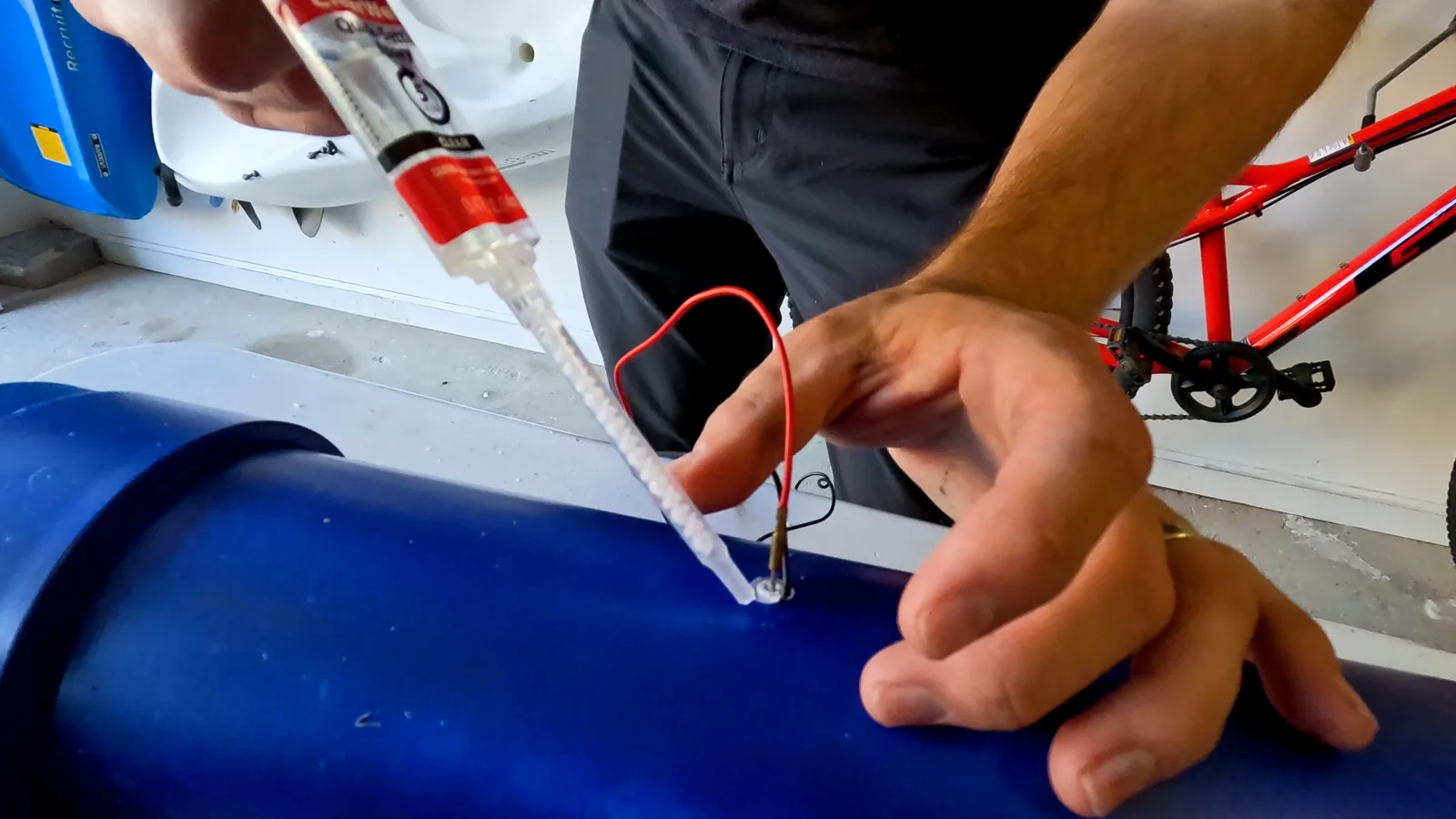 Adding glue to igniter in potato cannon