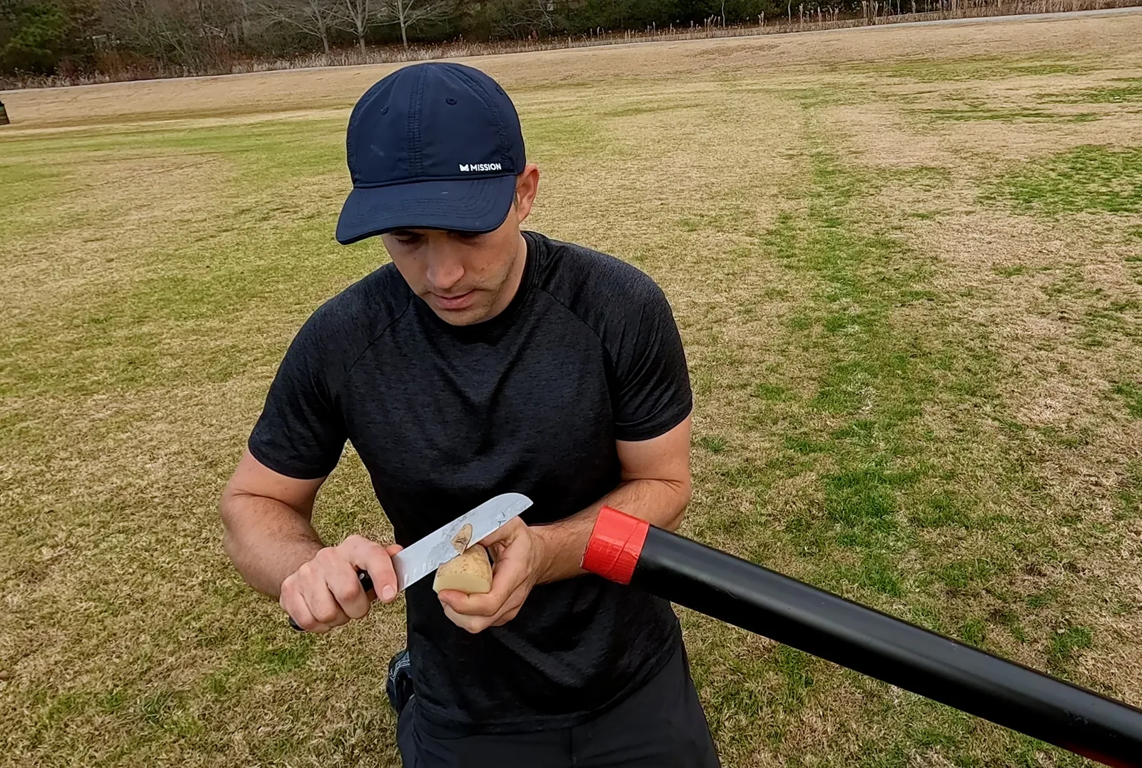 Man peels a potato for a cannon
