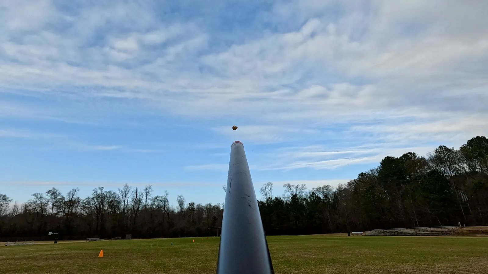Potato launches out of barrel of potato cannon