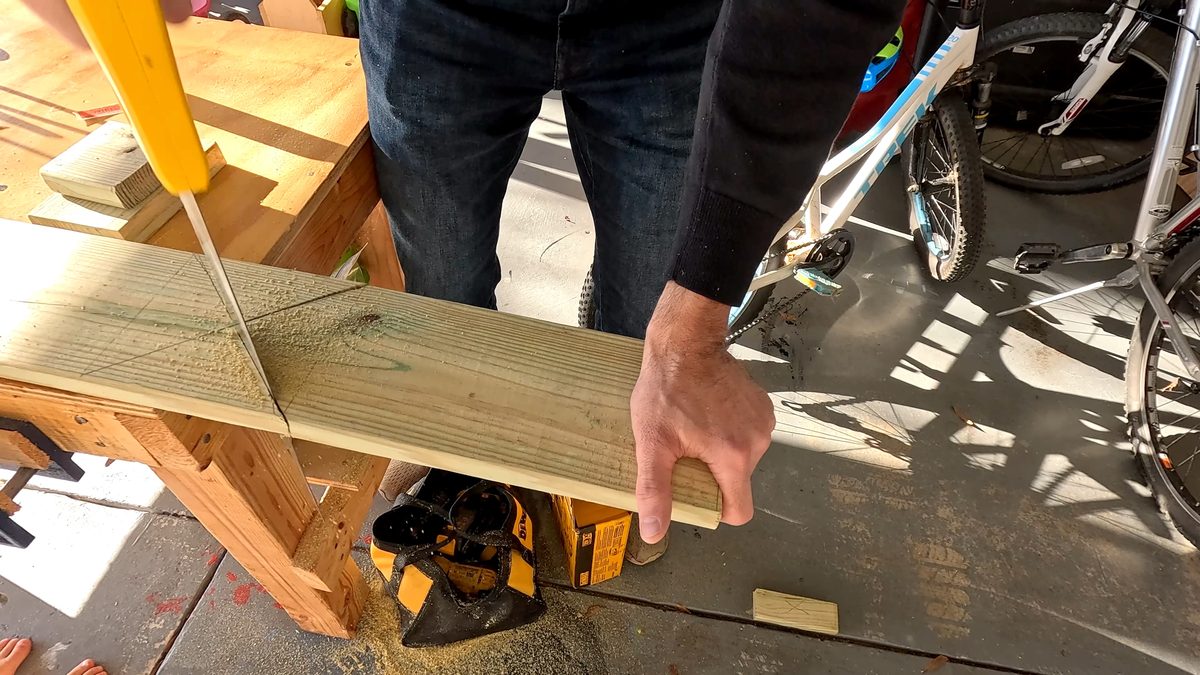 Cutting hull of boat out with saw